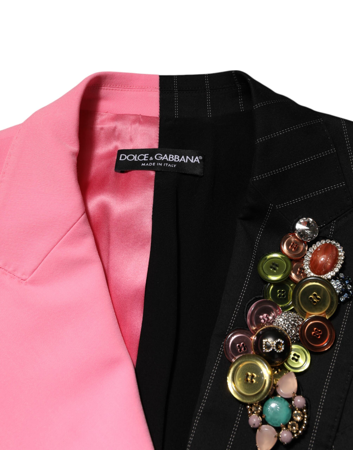 Discover the Dolce & Gabbana Multicolor Patchwork Embellished Coat Jacket, a masterpiece of Italian craftsmanship, blending opulent materials for an exquisite statement.