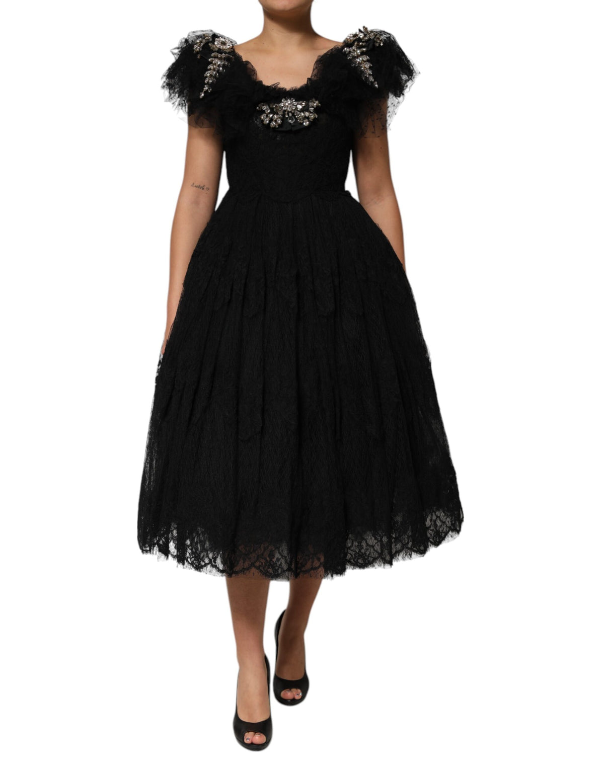 Elevate your elegance with the Dolce & Gabbana Black Crystal Embellished Midi A-line Dress, a masterpiece of Italian craftsmanship that embodies timeless allure and sophistication.