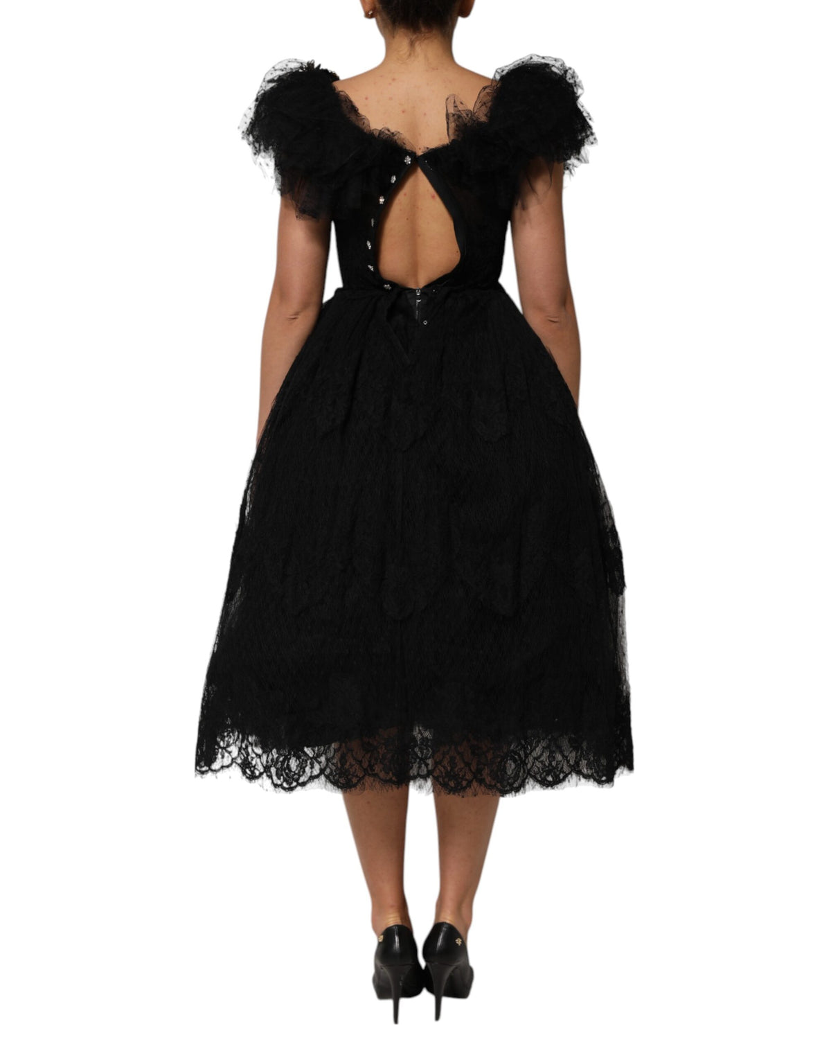 Indulge in the exquisite Dolce & Gabbana Black Crystal Embellished Midi A-line Dress, crafted in Italy with luxurious materials, embodying timeless elegance and allure.