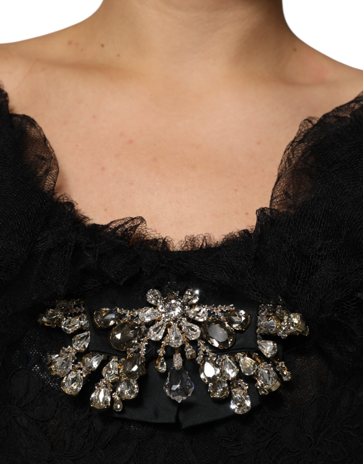 Indulge in the exquisite Dolce & Gabbana Black Crystal Embellished Midi A-line Dress, crafted in Italy from luxurious materials, embodying timeless elegance and sophistication.