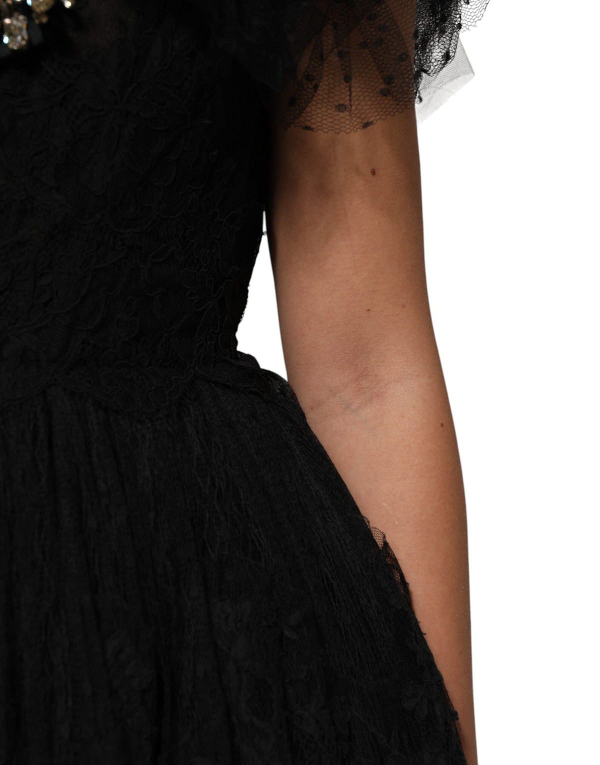 Indulge in the exquisite Dolce & Gabbana Black Crystal Embellished Midi A-line Dress, a timeless masterpiece crafted in Italy, embodying elegance and allure for the discerning individual.
