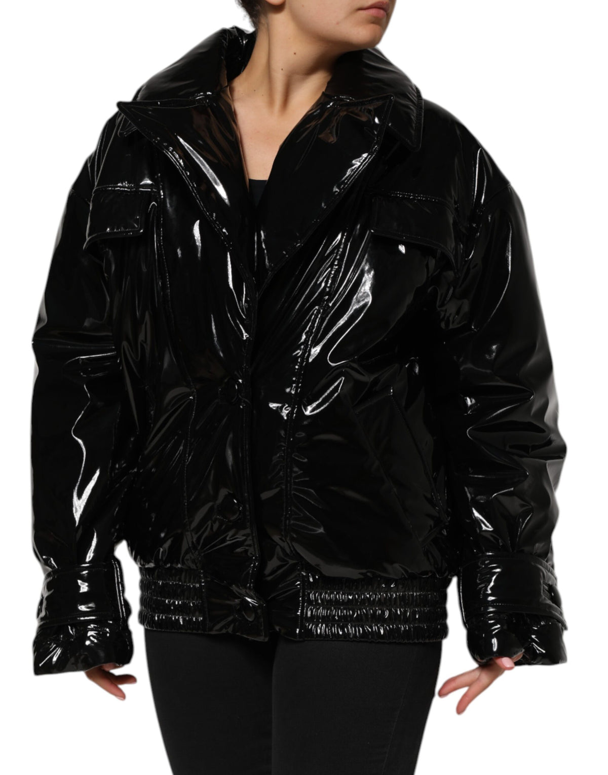 Elevate your style with the Dolce & Gabbana Black Polyester Quilted Puffer Coat, a masterpiece of Italian craftsmanship that embodies luxury and sophistication for every occasion.