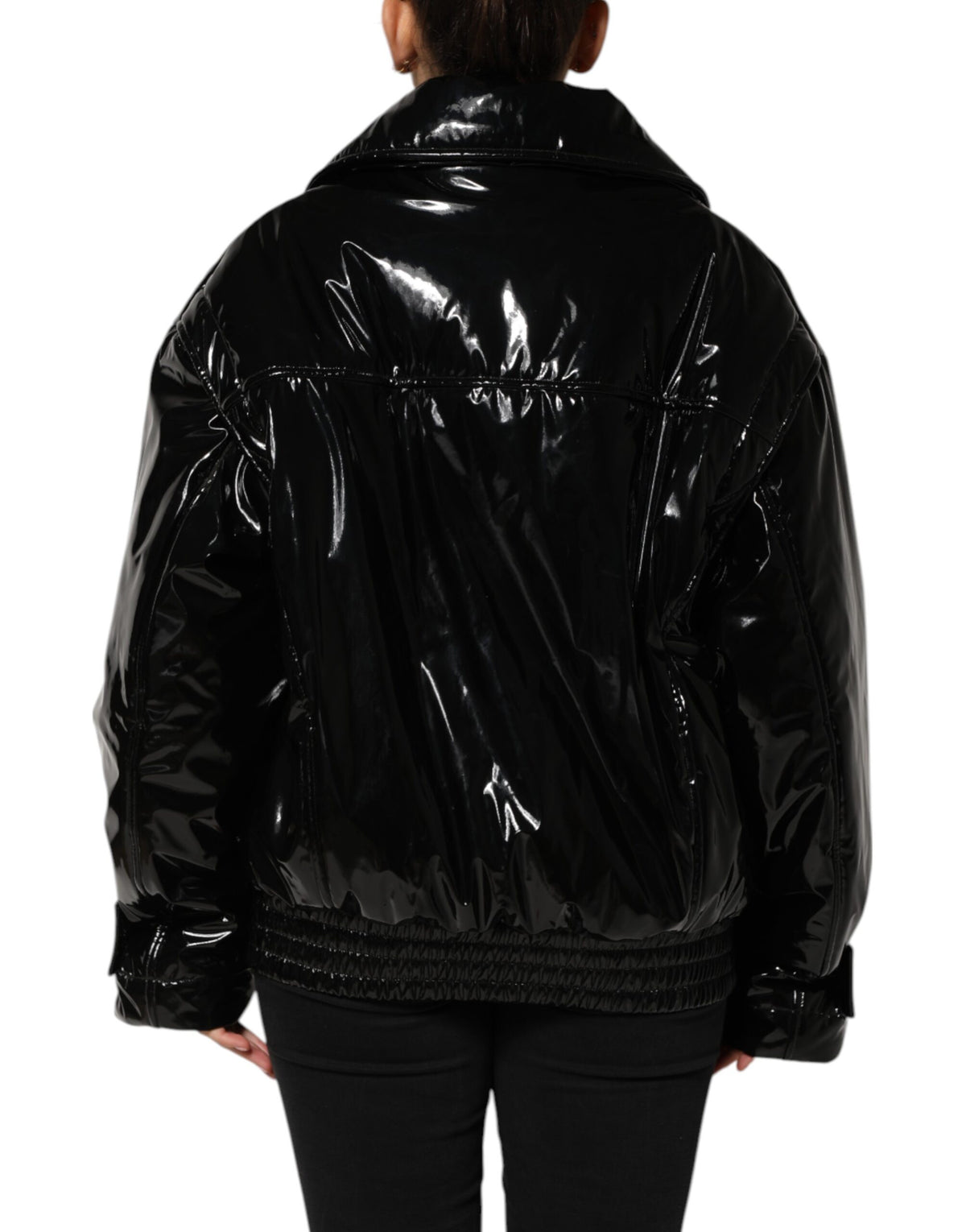 Elevate your style with the Dolce & Gabbana Black Polyester Quilted Puffer Coat, a masterpiece of Italian craftsmanship that embodies luxury and sophistication for every occasion.
