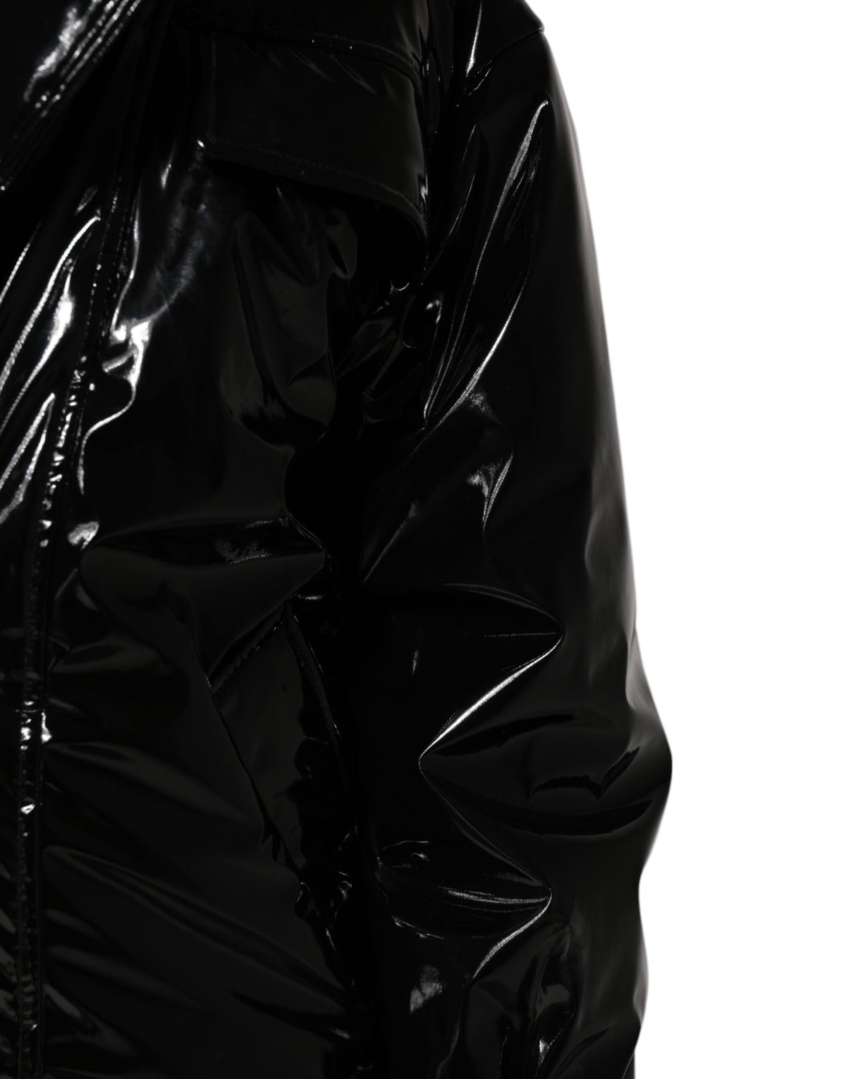 Indulge in the Dolce & Gabbana Black Polyester Quilted Puffer Coat, a masterpiece of Italian craftsmanship that elevates your style with luxurious warmth and sophistication.