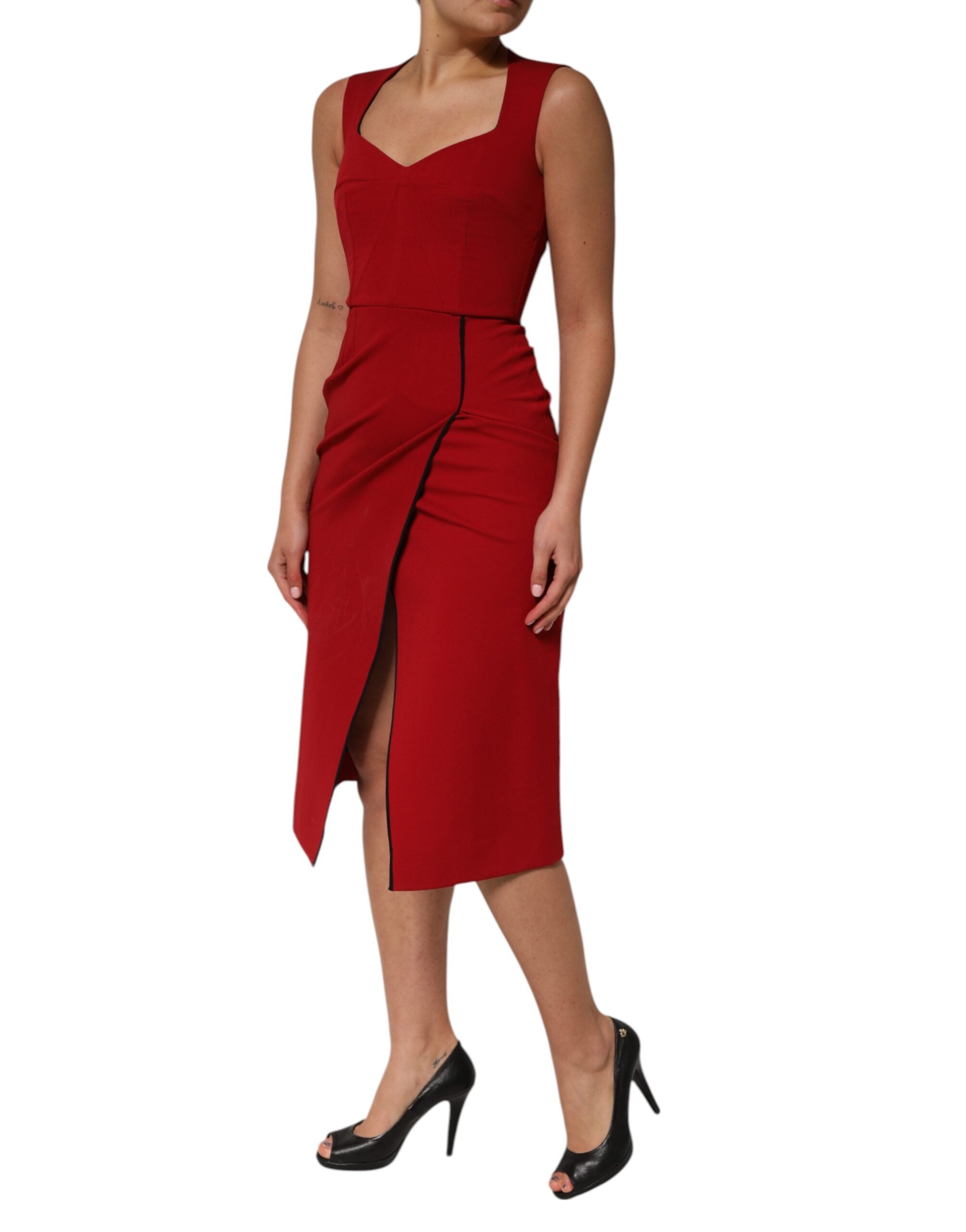 Indulge in the exquisite allure of the Dolce & Gabbana Red Viscose Stretch Slit Sheath Midi Dress, where luxurious craftsmanship meets timeless elegance for unforgettable moments.