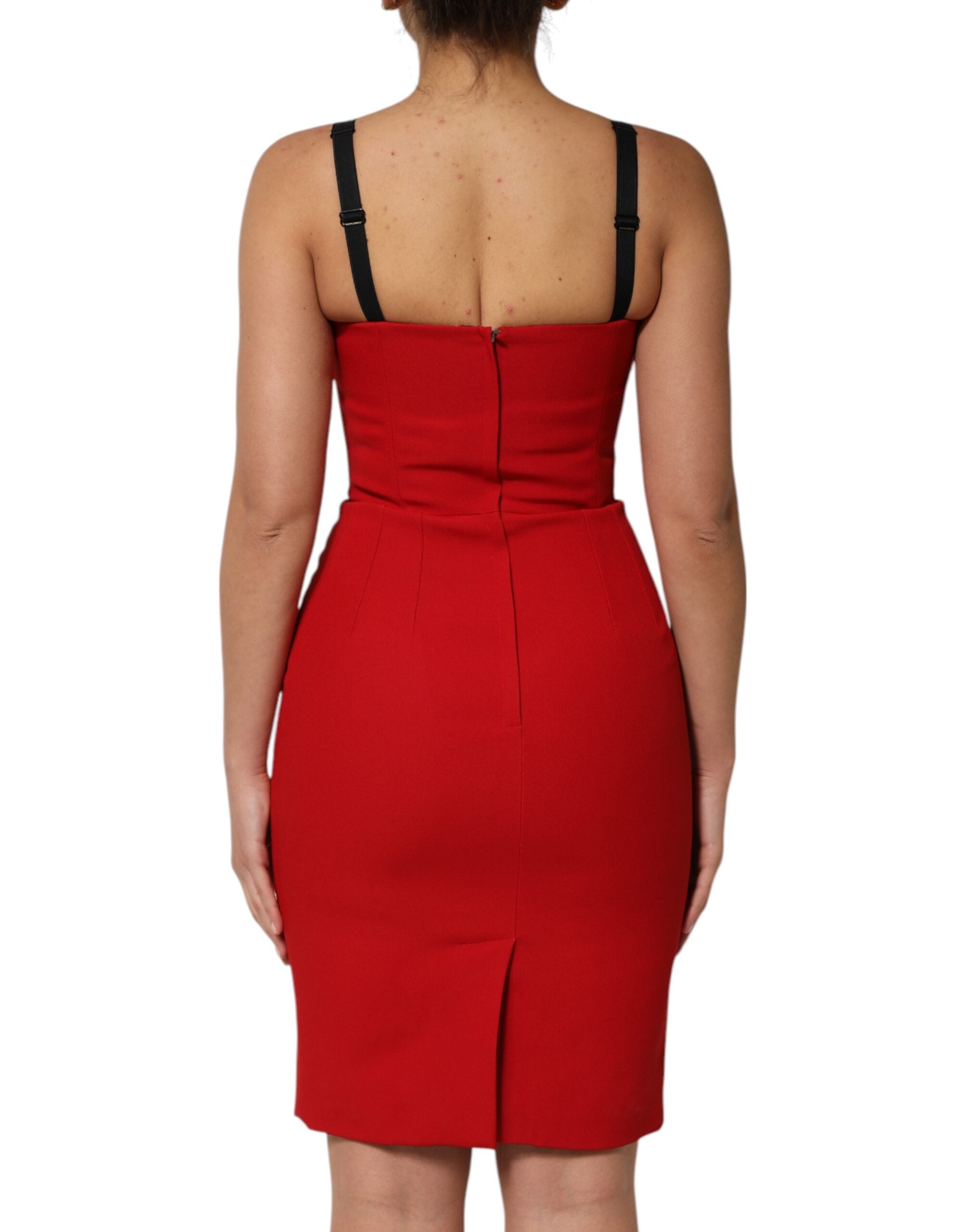 Indulge in the allure of the Dolce & Gabbana Red Stretch Bodycon Sheath Dress, a masterpiece of exquisite craftsmanship that embodies sensual sophistication and timeless elegance.
