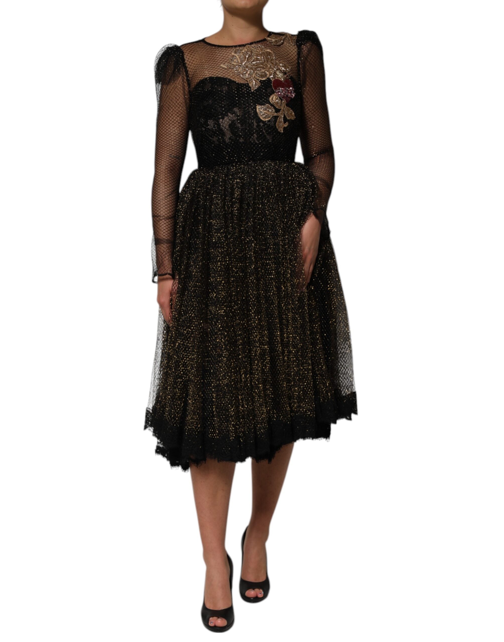Elevate your wardrobe with the Dolce & Gabbana Black Crystal Heart Embellished A-line Dress, a luxurious blend of silk and artistry, perfect for unforgettable moments.