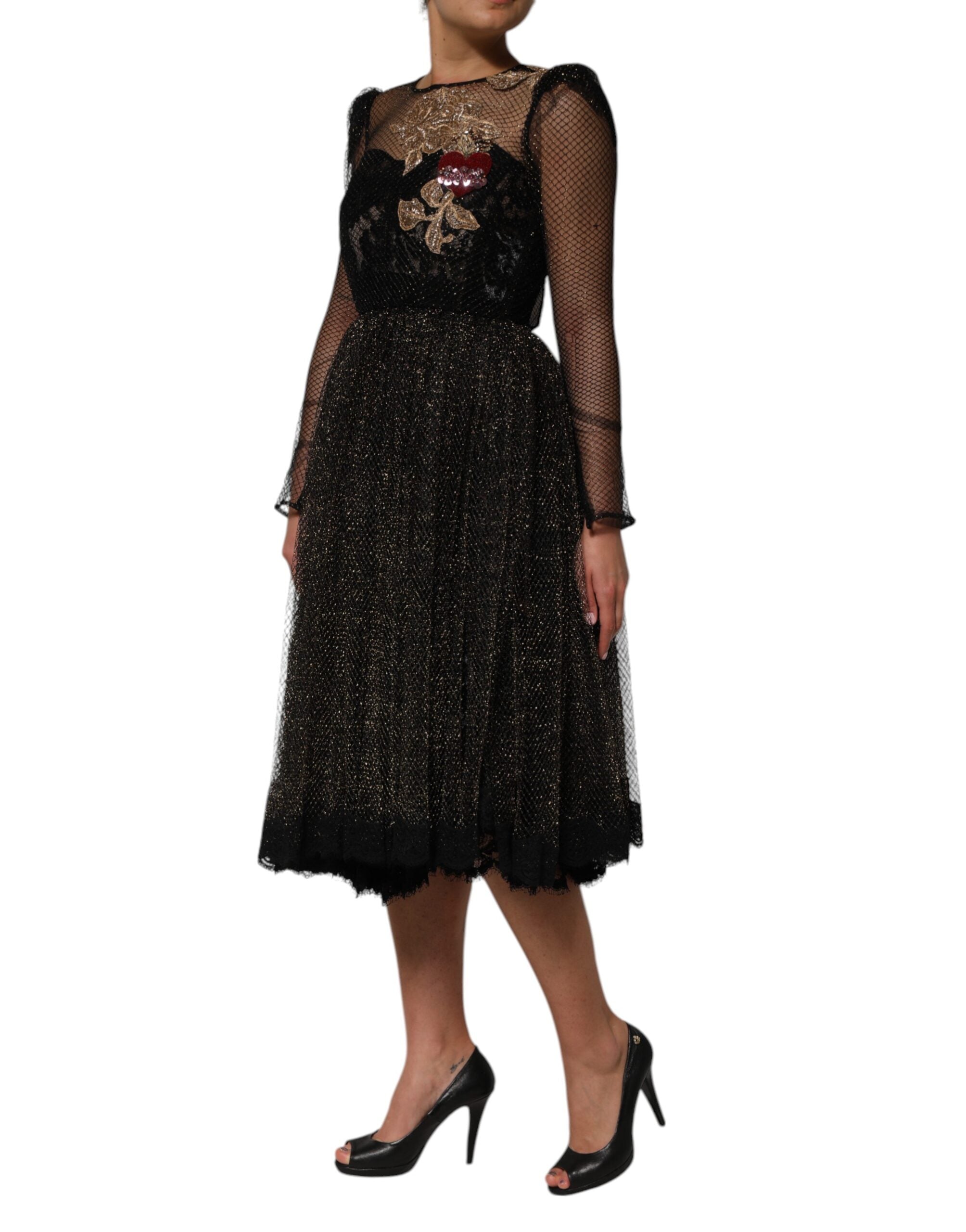 Experience the allure of the Dolce & Gabbana Black Crystal Heart Embellished A-line Dress, a testament to Italian craftsmanship and luxury, perfect for unforgettable moments.