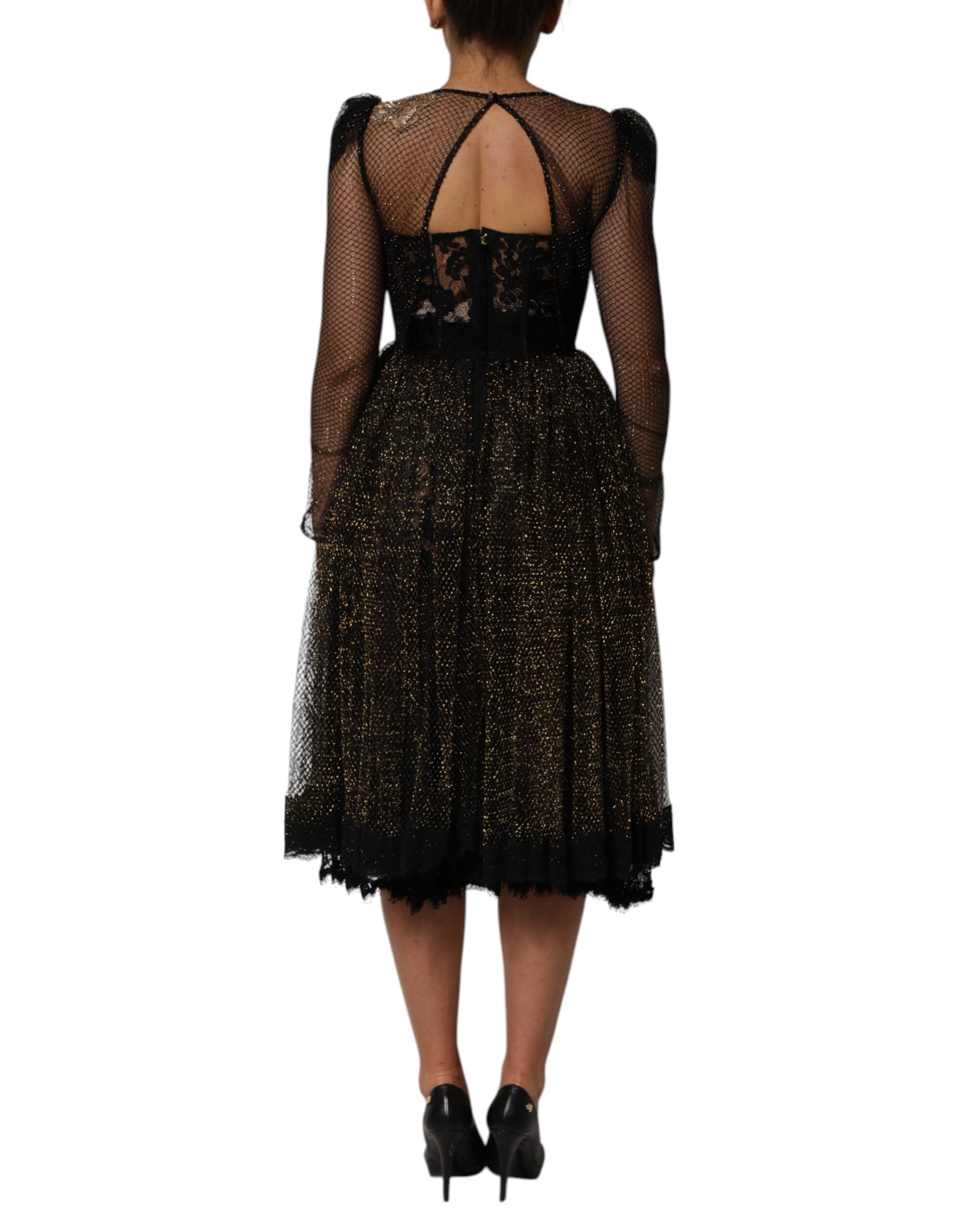 Experience the allure of the Dolce & Gabbana Black Crystal Heart Embellished A-line Dress, a masterpiece of Italian craftsmanship that embodies luxury and sophistication.