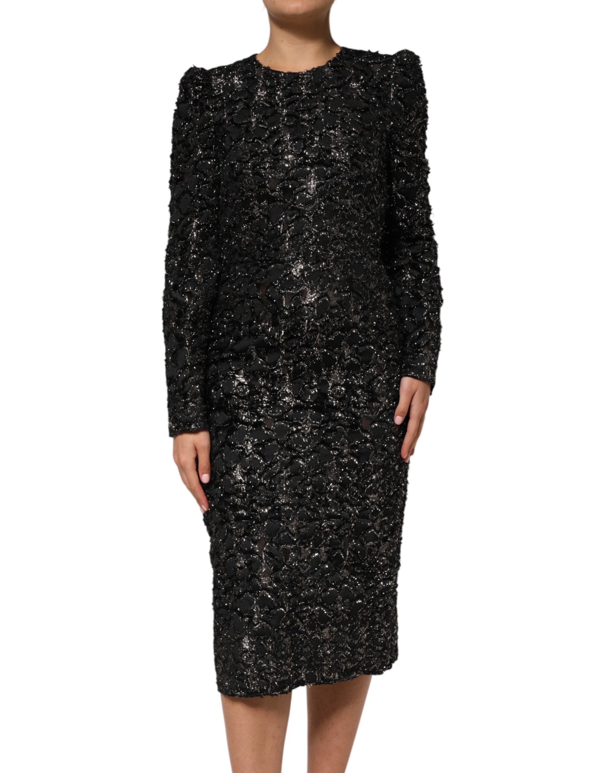 Indulge in the Dolce & Gabbana Black Sequin Bouclé Tweed Sheath Dress, a masterpiece of Italian craftsmanship that exudes timeless elegance and luxurious allure.