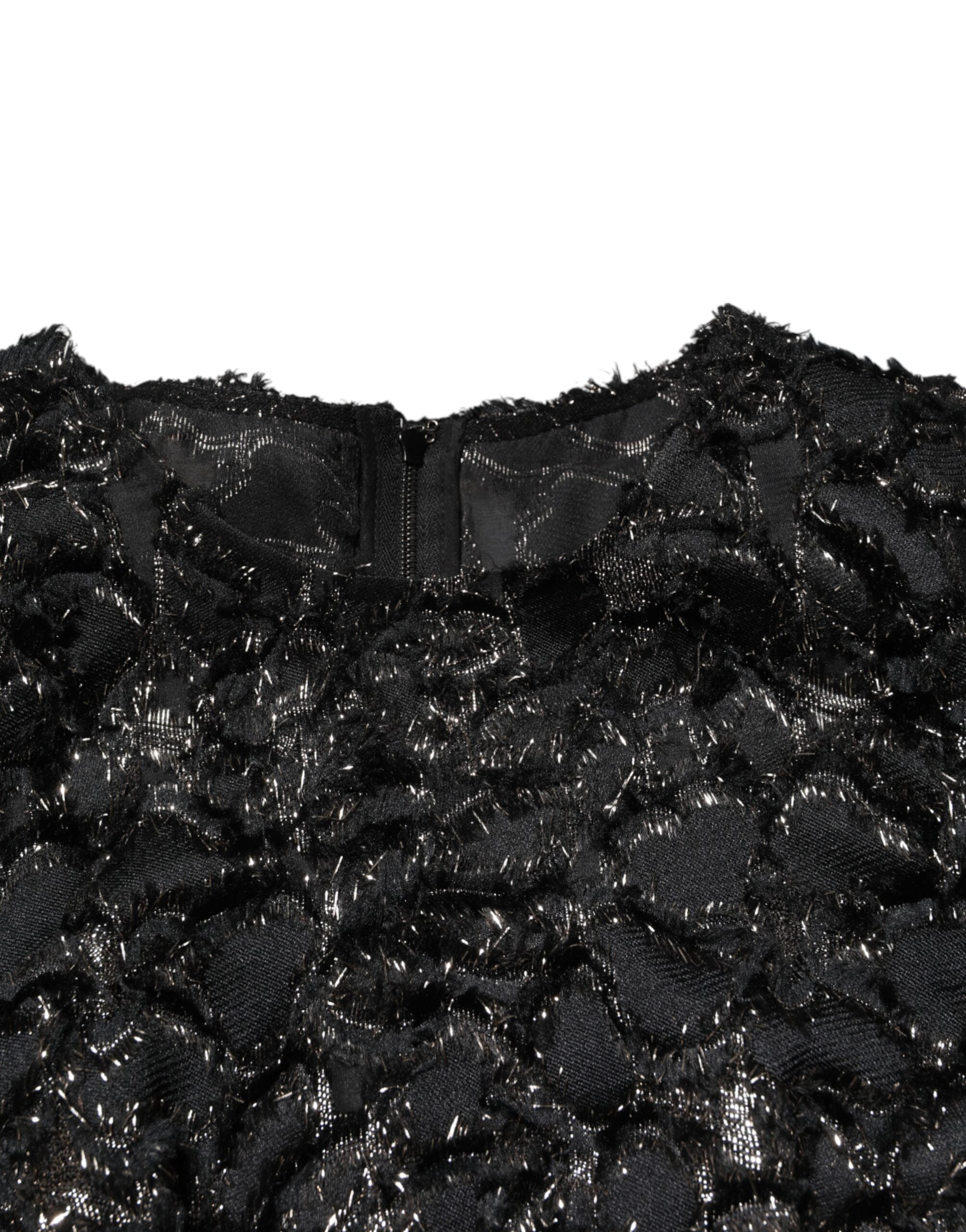 Experience the allure of the Dolce & Gabbana Black Sequin Bouclé Tweed Sheath Dress, a masterpiece of Italian craftsmanship that redefines luxury and sophistication.