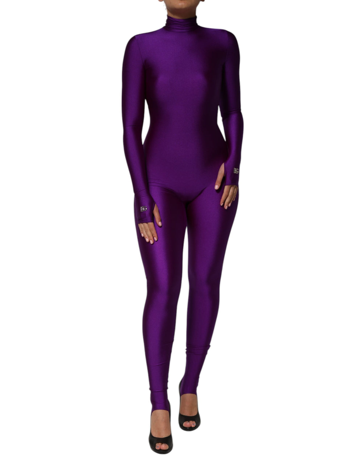 Experience the exquisite allure of the Dolce & Gabbana Purple Nylon Turtleneck Bodycon Jumpsuit Dress, a masterpiece of Italian craftsmanship designed for the confident individual.
