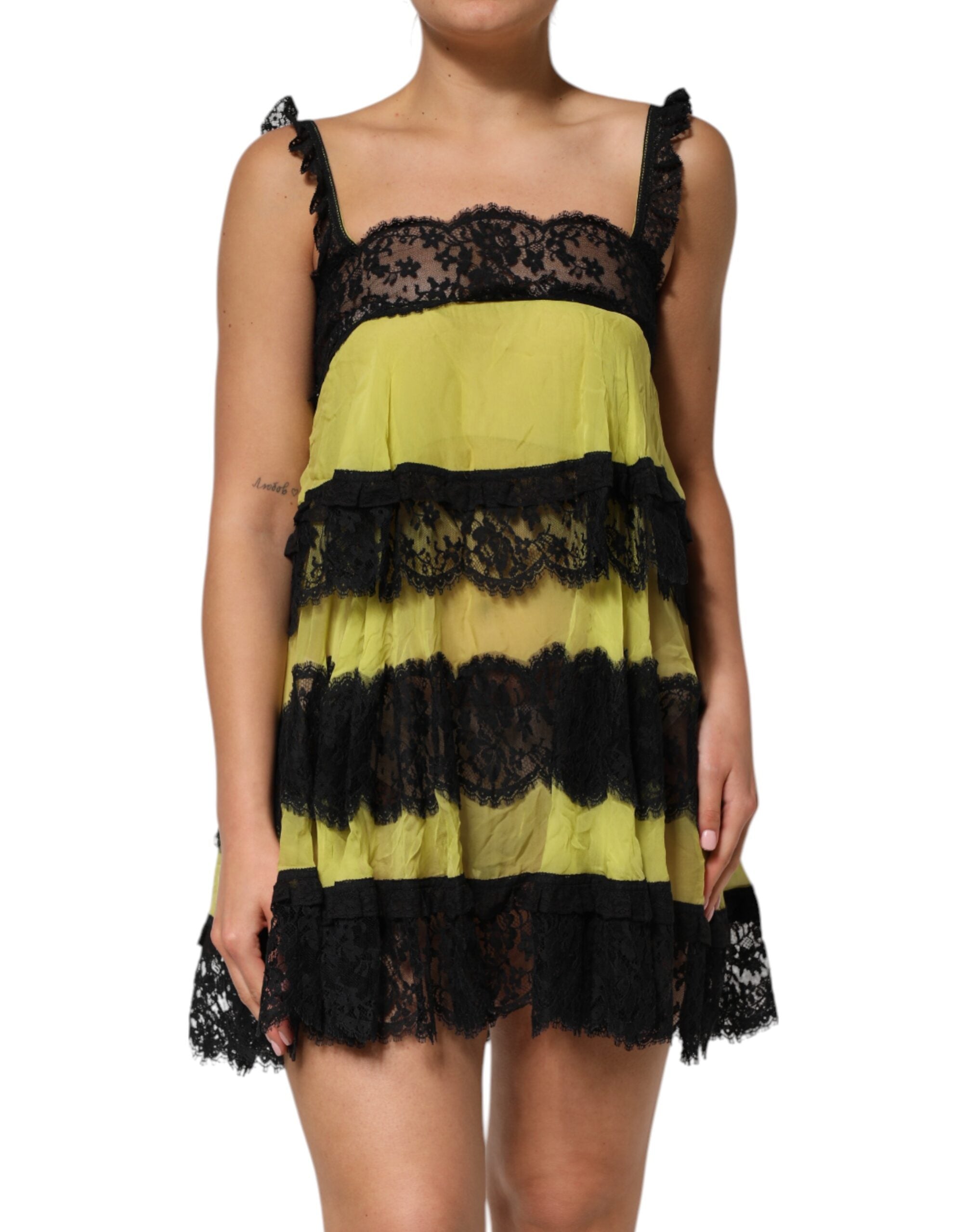 Indulge in the Dolce & Gabbana Yellow Black Babydoll Chemise, a luxurious blend of silk and lace, epitomizing sensual elegance and timeless Italian craftsmanship.