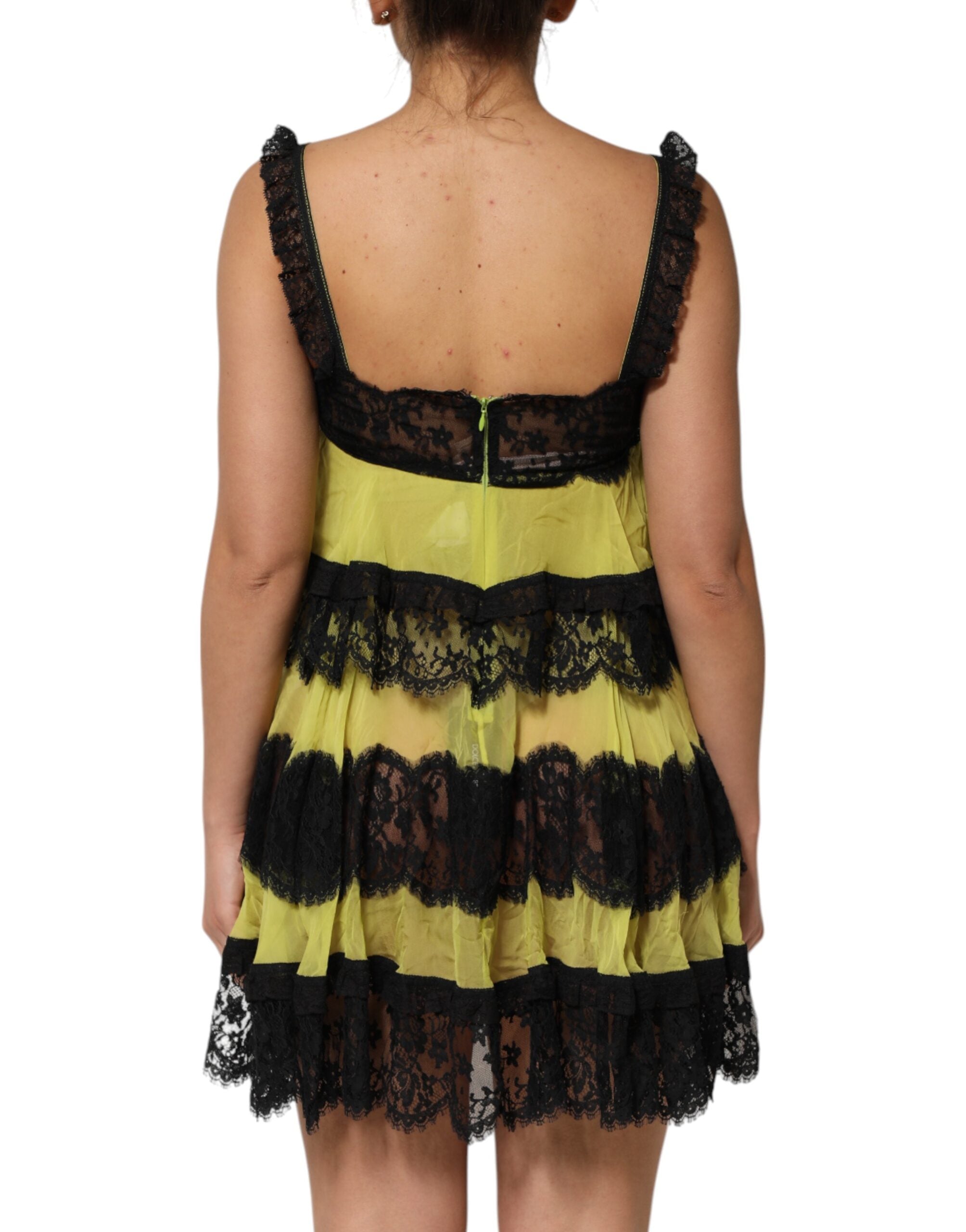 Indulge in the exquisite Dolce & Gabbana Yellow Black Babydoll Chemise, a luxurious blend of silk and lace that embodies sensual elegance and timeless craftsmanship.