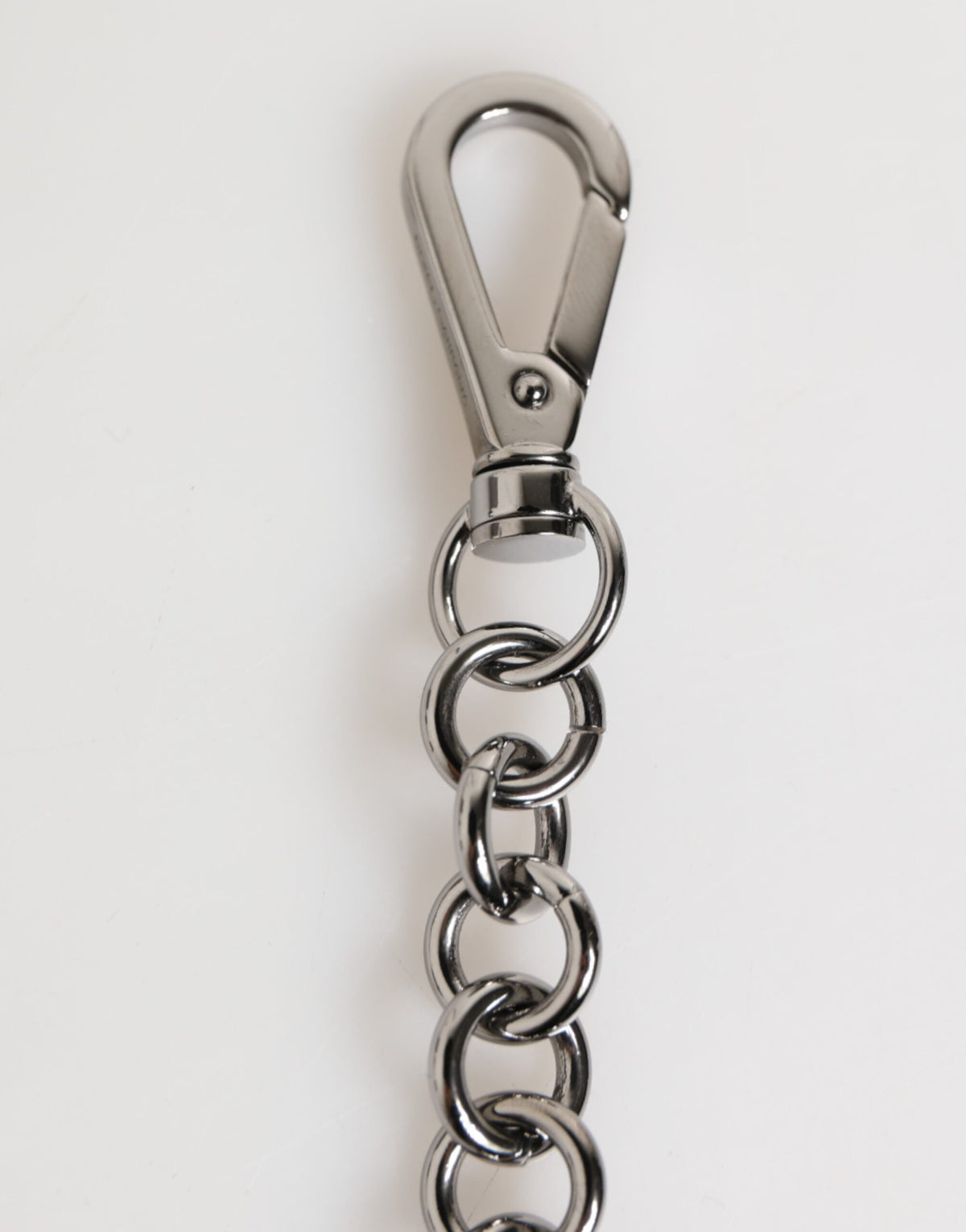 Elevate your style with the Dolce & Gabbana Black White DG Rubber Logo Keychain, a luxurious blend of exquisite materials and Italian craftsmanship, embodying sophistication.