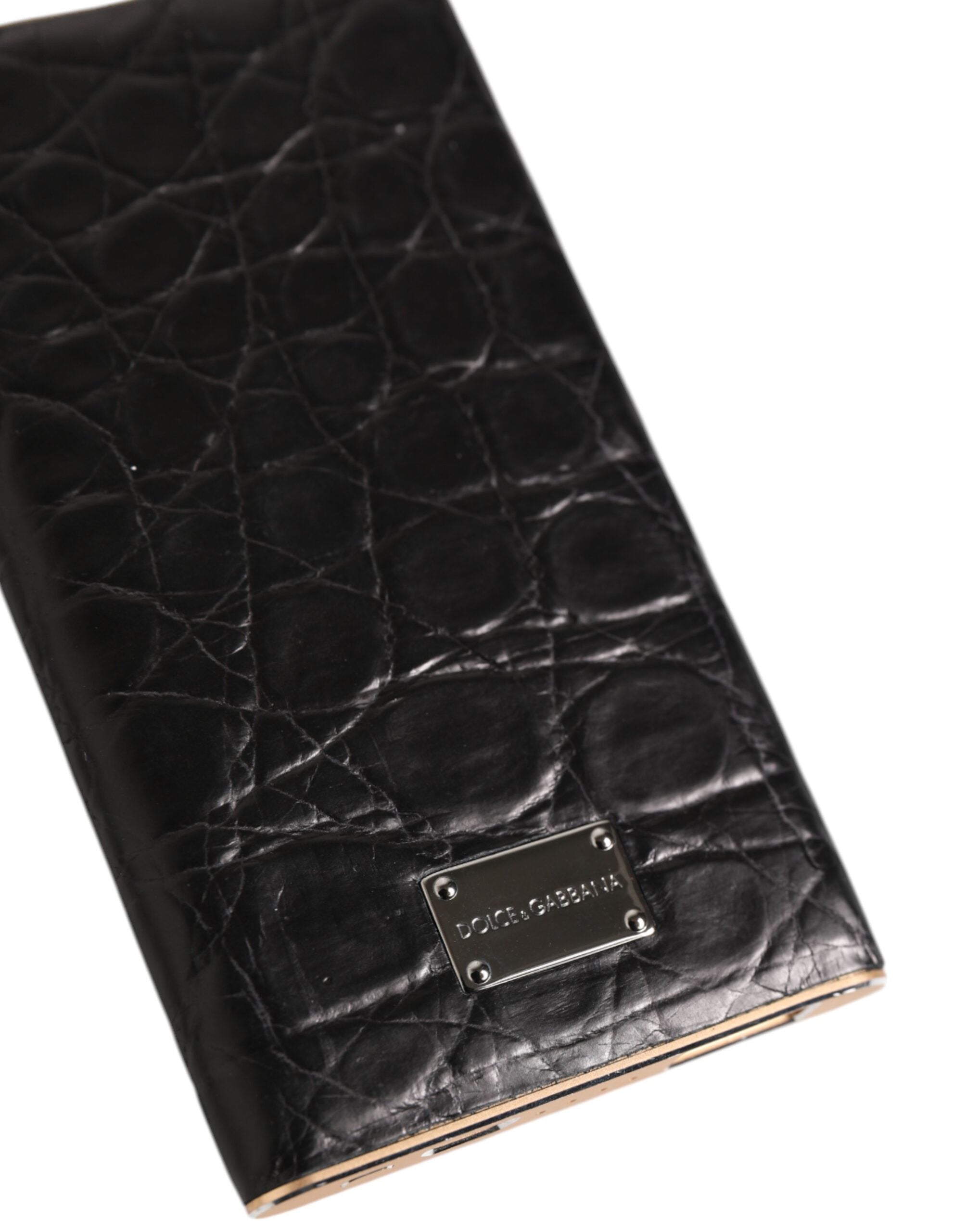 Elevate your style with the Dolce & Gabbana Black Leather Exotic Skin Power Bank, a blend of exquisite craftsmanship and luxury, perfect for the discerning individual.