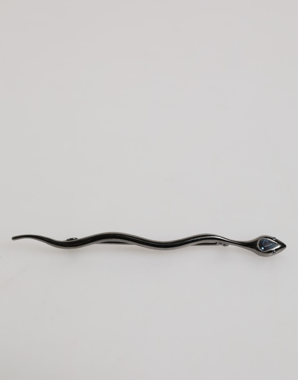 Discover the Dolce & Gabbana Black Brass Crystal Spilla Serpente Brooch, an exquisite blend of artistry and elegance, crafted in Italy to elevate your allure.