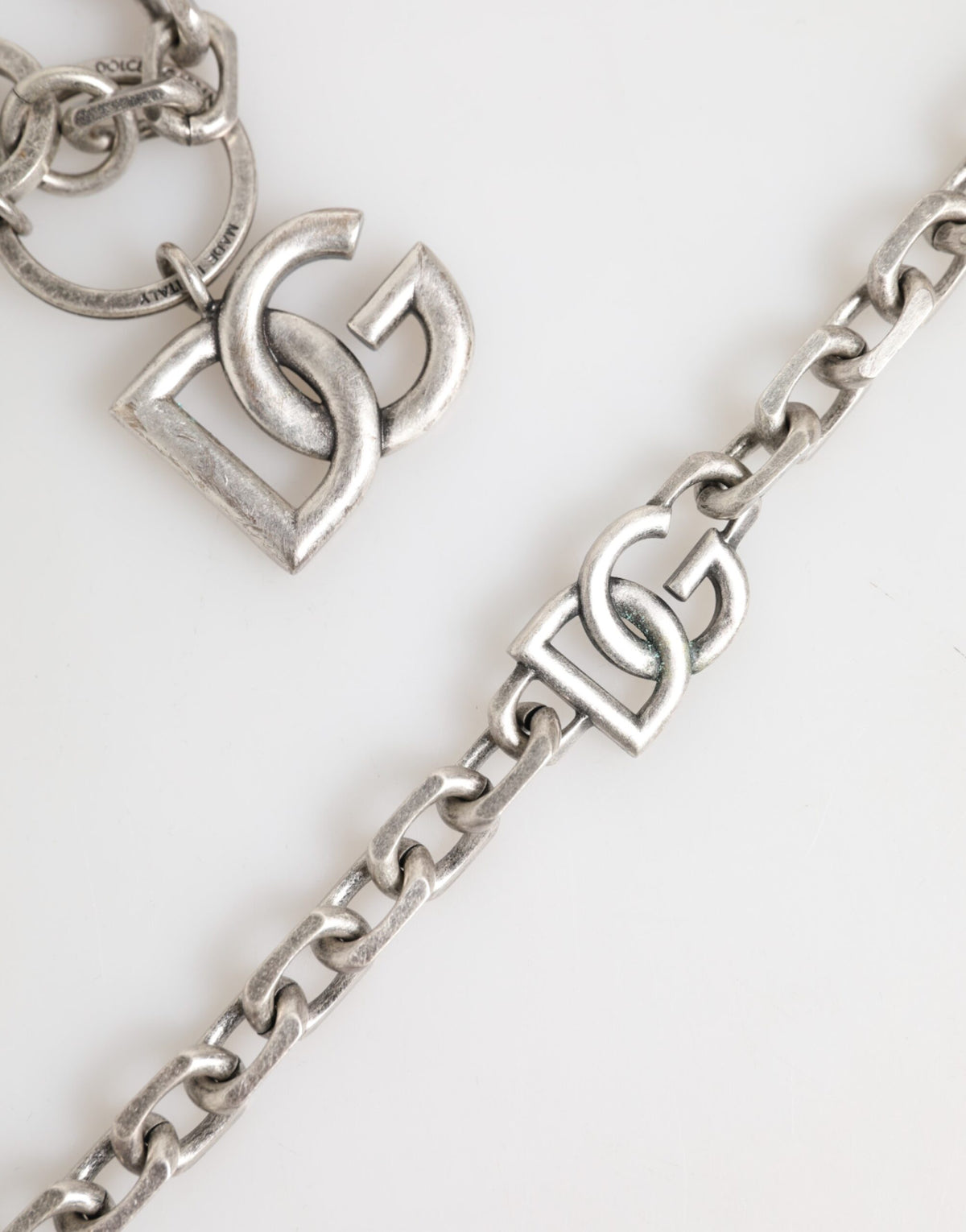 Elevate your style with the Dolce & Gabbana Silver Tone Brass DG Logo Detailing Chain Necklace, a masterpiece of Italian craftsmanship that embodies timeless elegance and sophistication.
