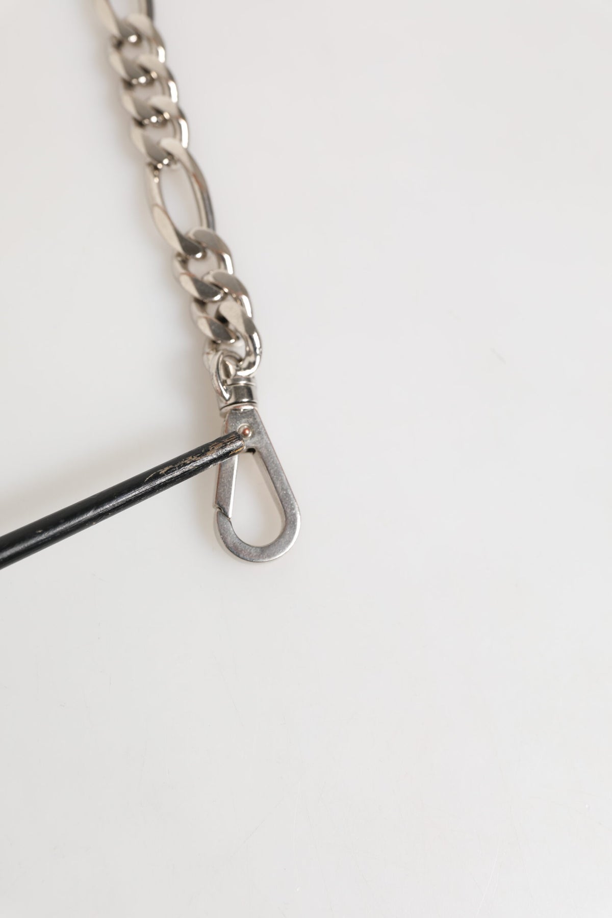 Discover the allure of the Dolce & Gabbana Silver Tone Brass Chain DG Logo Bracelet, a masterpiece of Italian craftsmanship that elevates your style with timeless elegance.