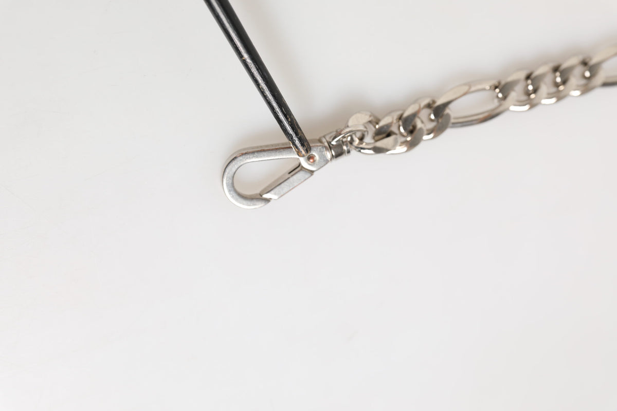 Elevate your style with the Dolce & Gabbana Silver Tone Brass Chain Lobster Clasp DG Logo Bracelet, a testament to Italian craftsmanship and timeless elegance.