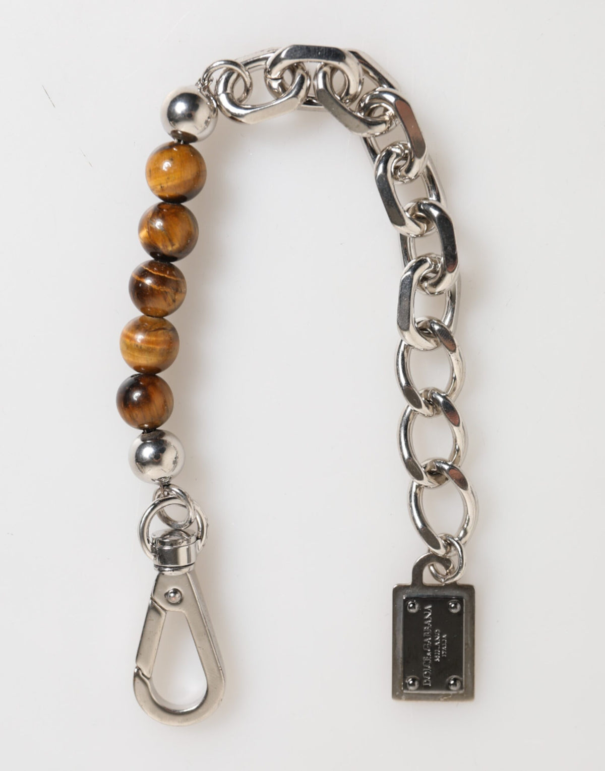 Discover the Dolce & Gabbana Silver Chain Brass Beaded Lobster Clasp Bracelet, a masterpiece of Italian craftsmanship that embodies timeless elegance and sophistication.