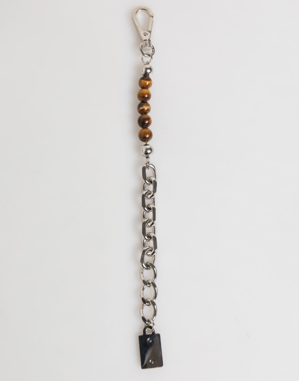 Indulge in the Dolce & Gabbana Silver Chain Brass Beaded Lobster Clasp Bracelet, a masterpiece of Italian craftsmanship that embodies timeless elegance and sophistication.