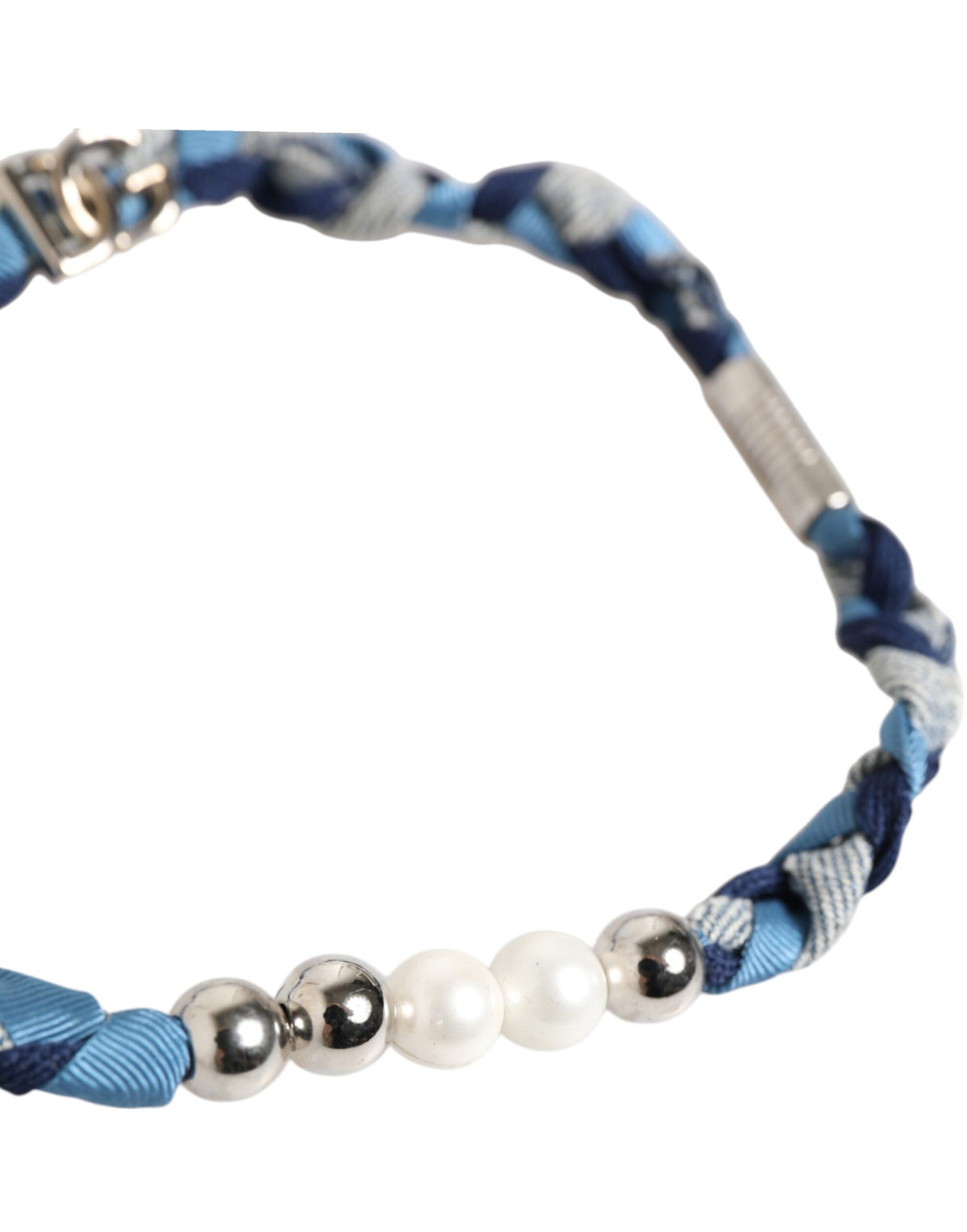 Discover the exquisite Dolce & Gabbana Blue White Braided Bracelet, a timeless statement of luxury and craftsmanship, perfect for the discerning individual.