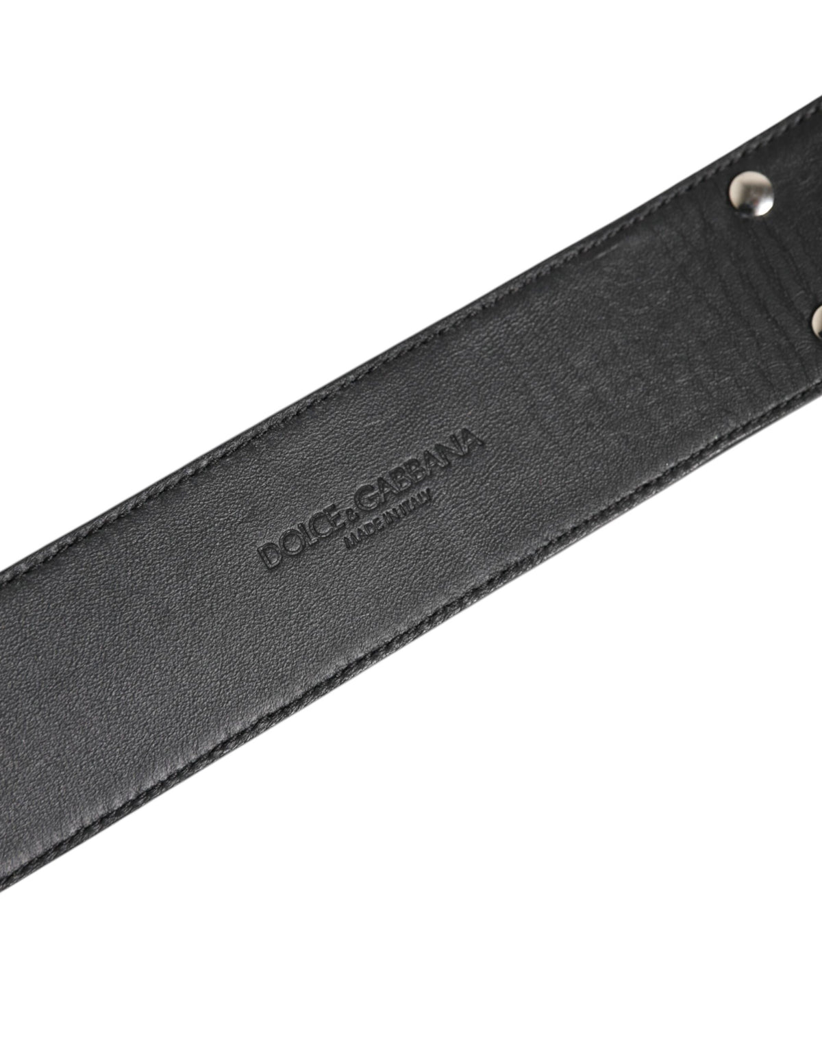 Elevate your elegance with the Dolce & Gabbana Silver Textured Leather Neckband, a testament to Italian craftsmanship that embodies luxury and sophistication.