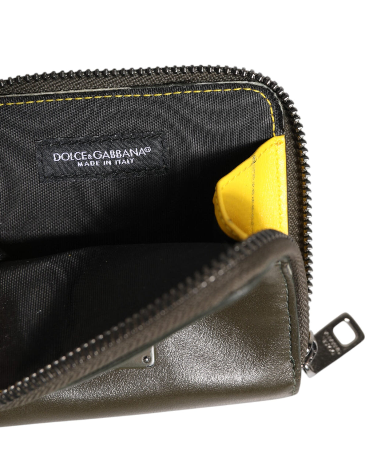 Indulge in the exquisite Dolce & Gabbana Brown Leather Logo Plaque Card Holder Wallet, a timeless accessory crafted from luxurious Italian leather, embodying sophistication and elegance.