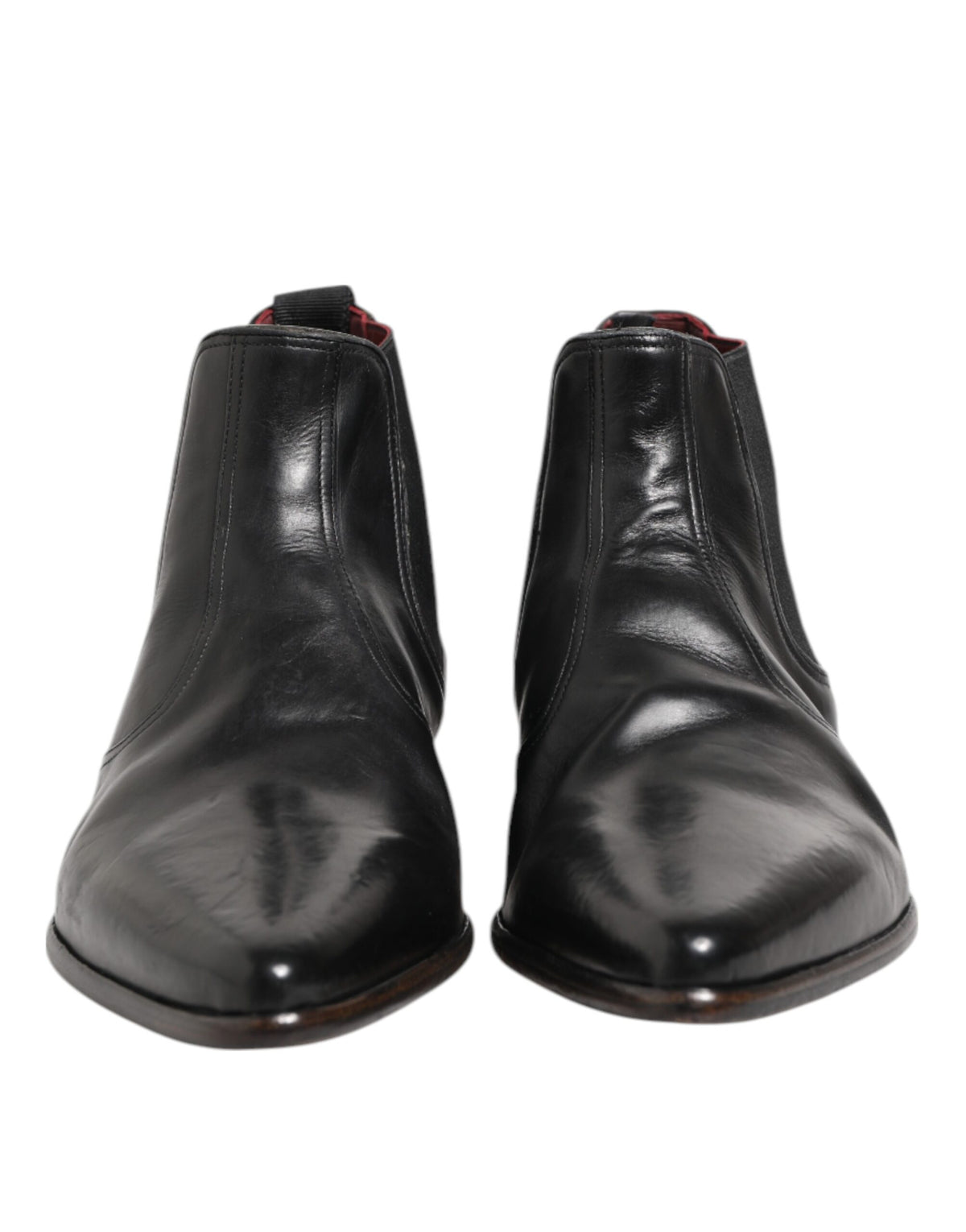 Experience the allure of Dolce & Gabbana's Black Chelsea Slip On Boots, crafted from premium calf leather for timeless elegance and unmatched sophistication.