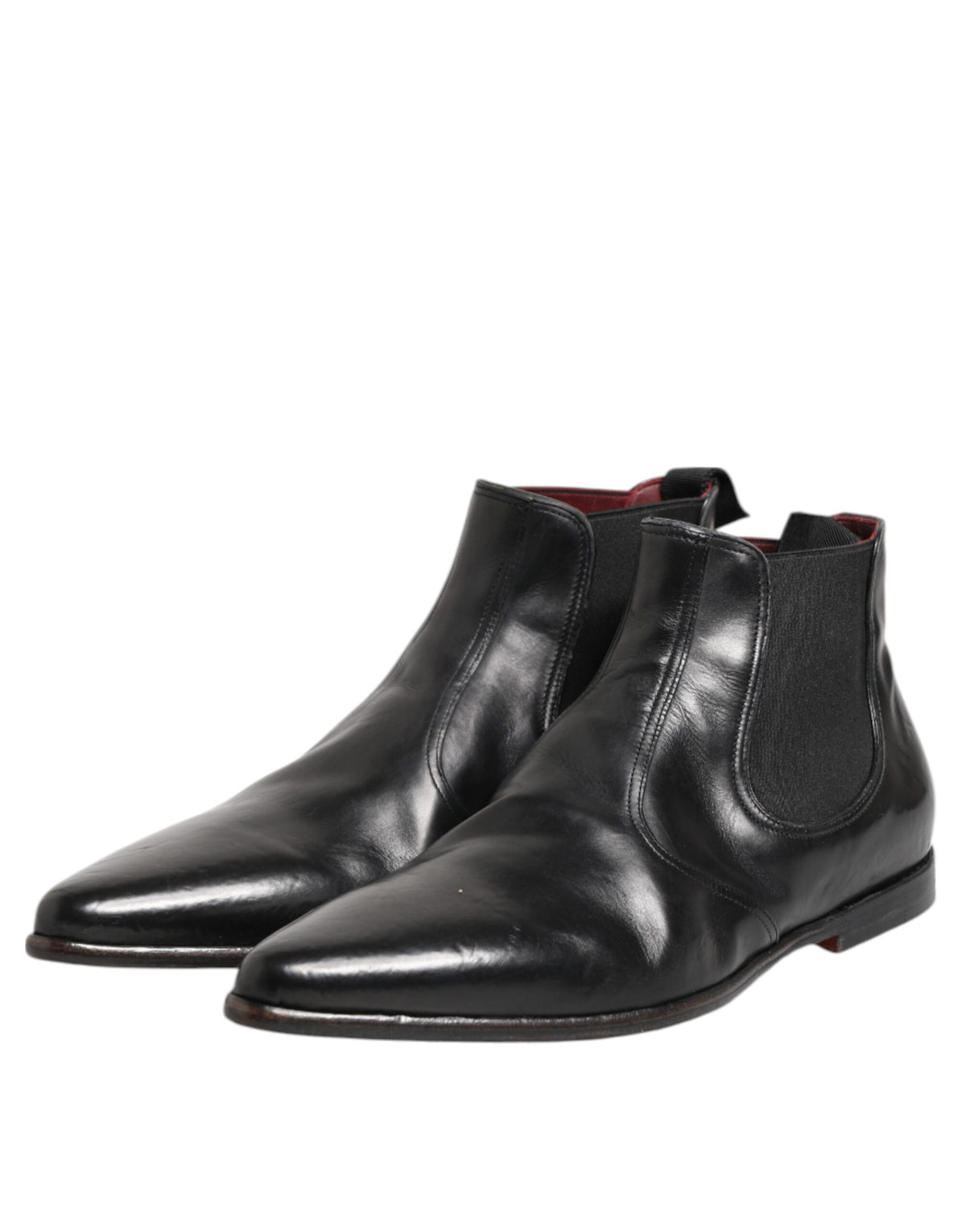 Elevate your style with Dolce & Gabbana's Black Chelsea Slip On Boots, crafted from premium calf leather, embodying timeless luxury and exquisite Italian craftsmanship.