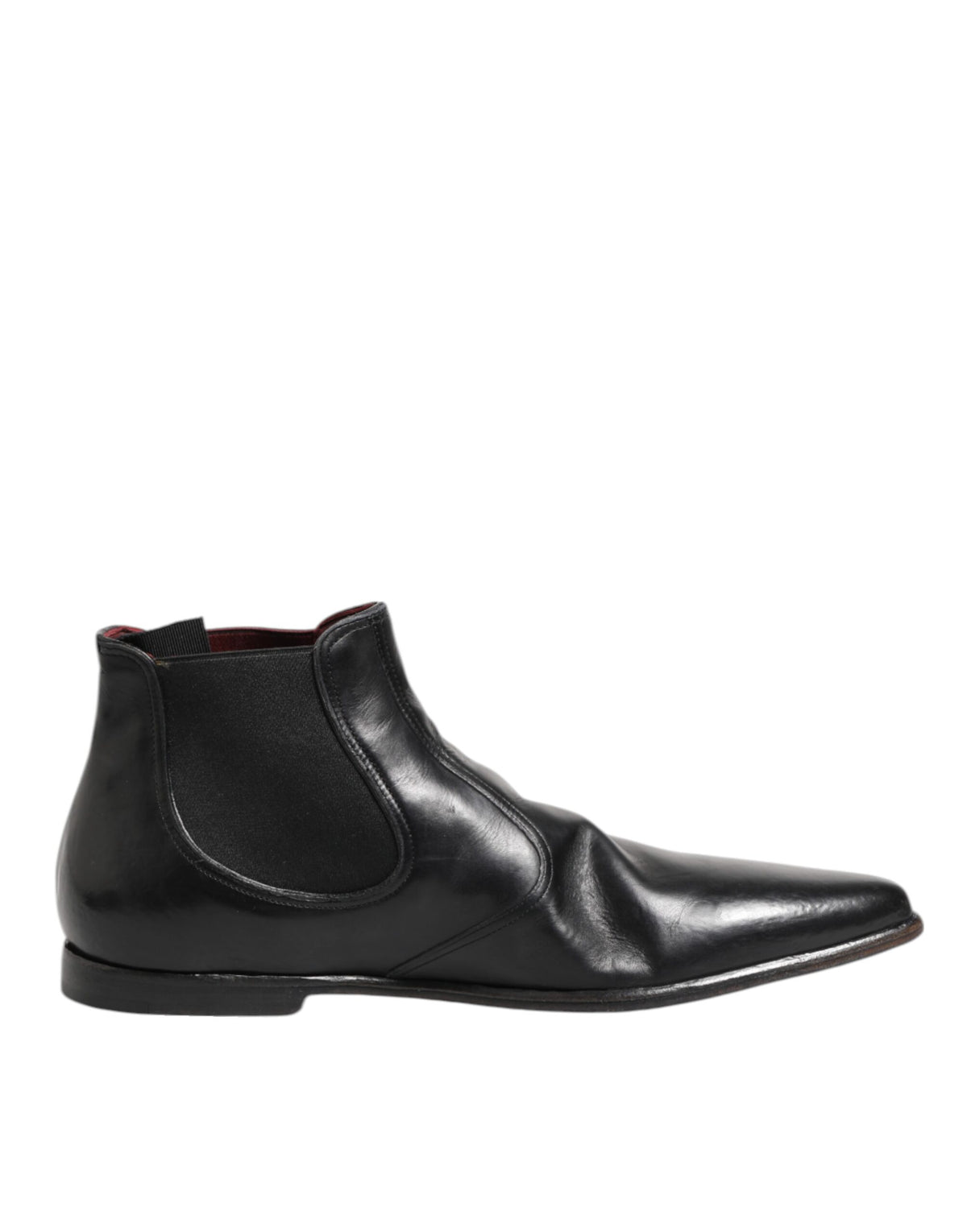 Elevate your style with Dolce & Gabbana's Black Chelsea Slip On Boots, crafted from premium calf leather, embodying timeless luxury and exquisite Italian craftsmanship.