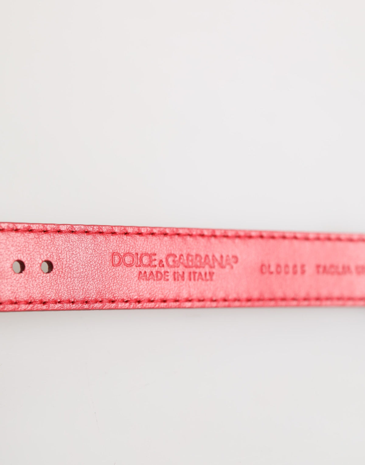 Indulge in the opulence of the Dolce & Gabbana Red Exotic Leather Armband, a testament to Italian craftsmanship that elevates your elegance and sophistication.