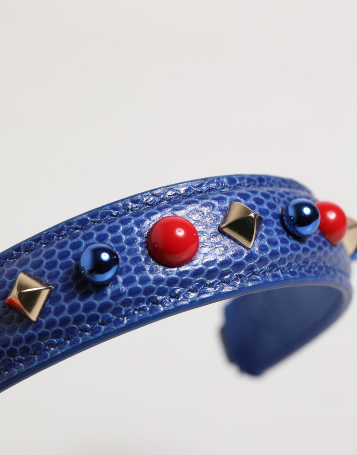 Elevate your style with the Dolce & Gabbana Blue Embellished Leather Shoulder Strap, a masterpiece of Italian craftsmanship that embodies luxury and sophistication.