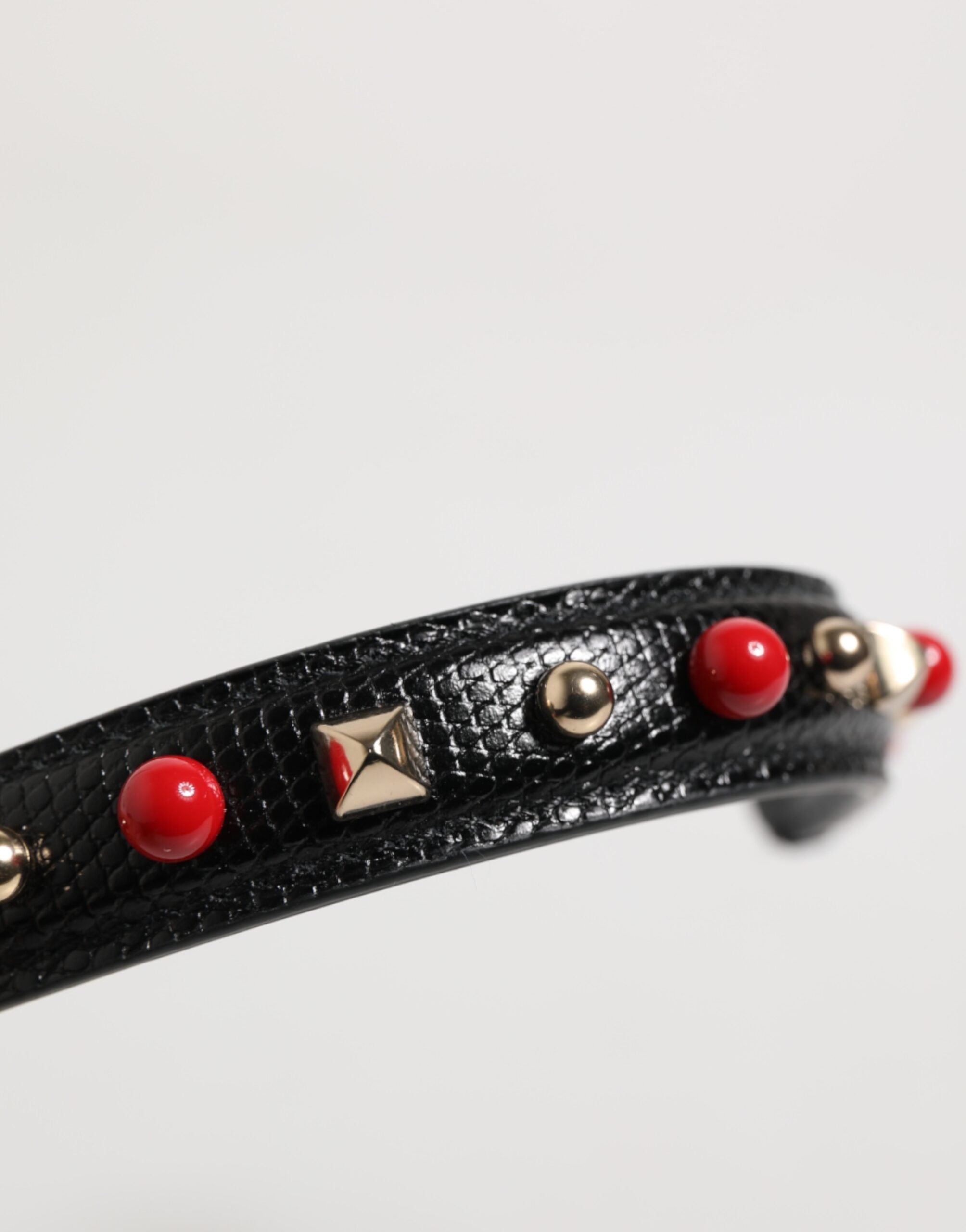 Elevate your style with the Dolce & Gabbana Black Embellished Leather Bag Handle, a testament to exquisite Italian craftsmanship and timeless elegance.