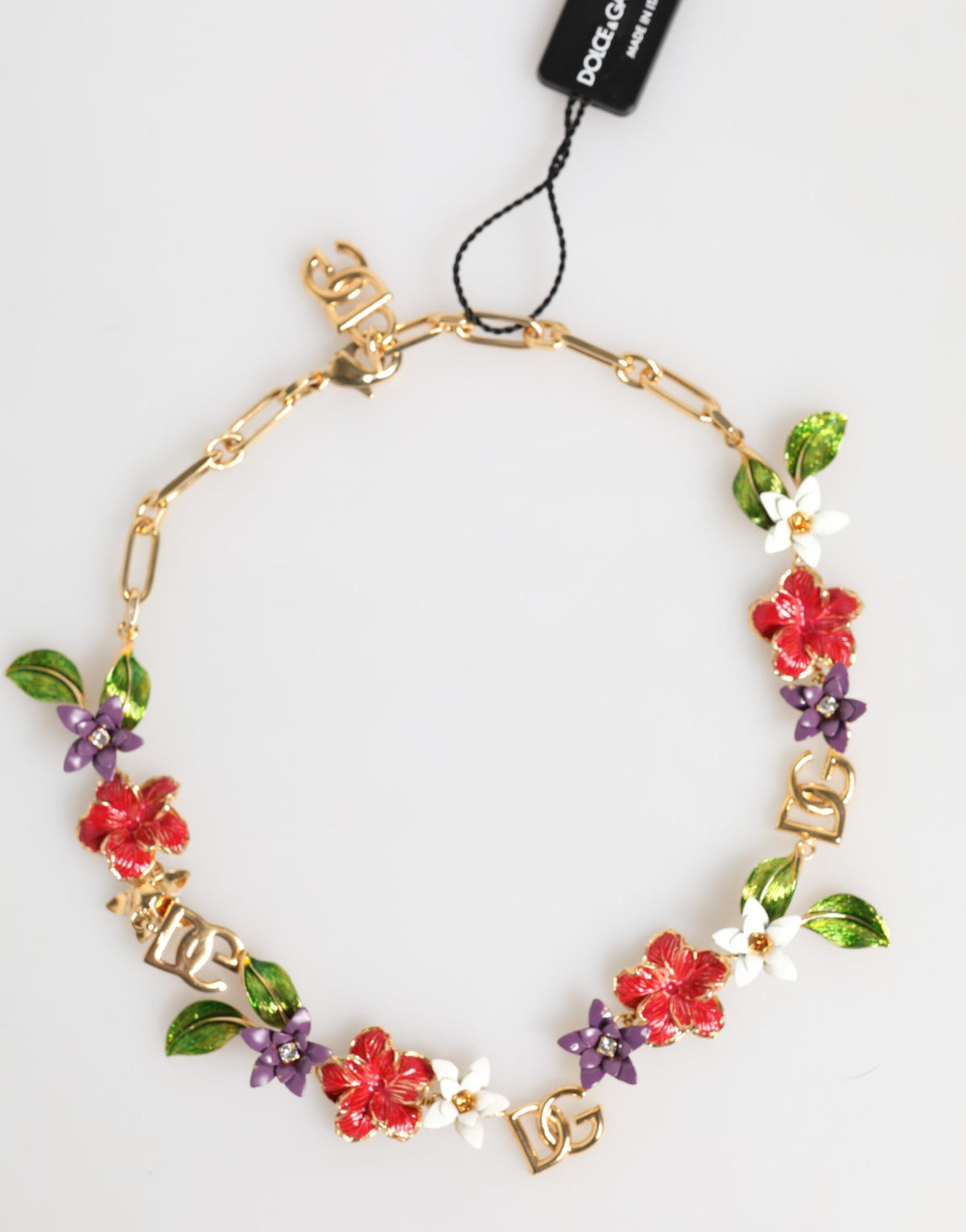 Indulge in the exquisite Dolce & Gabbana Gold Brass Logo Detail Floral Necklace, a masterpiece of craftsmanship that elevates your style with timeless elegance and luxurious allure.