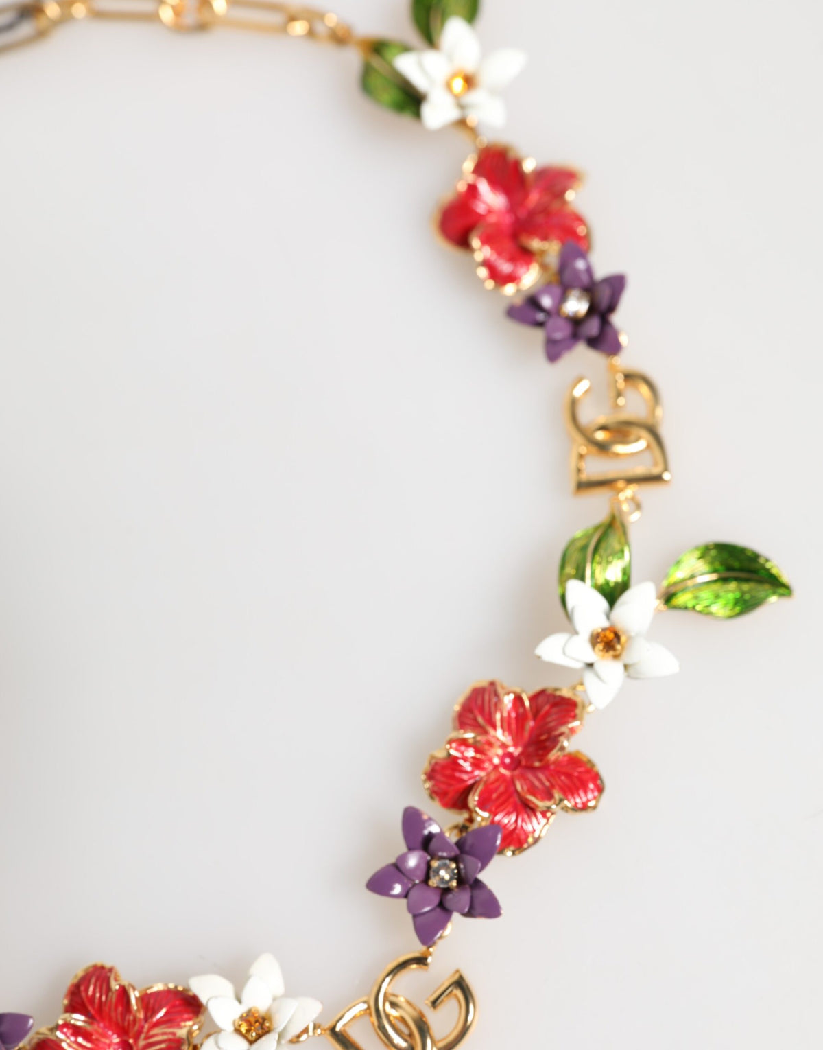 Elevate your elegance with the Dolce & Gabbana Gold Brass Logo Detail Floral Necklace, a masterpiece of exquisite craftsmanship and timeless allure, perfect for the discerning connoisseur.