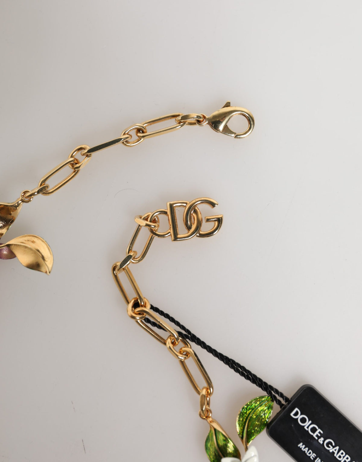Elevate your elegance with the Dolce & Gabbana Gold Brass Logo Detail Floral Necklace, a masterpiece of exquisite craftsmanship, perfect for the discerning individual.