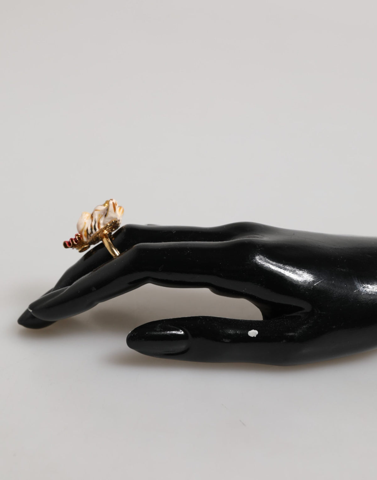 Indulge in the exquisite Dolce & Gabbana Gold Brass Resin Beige Dog Pet Accessory Ring, a timeless blend of Italian craftsmanship and luxurious elegance, perfect for the discerning connoisseur.