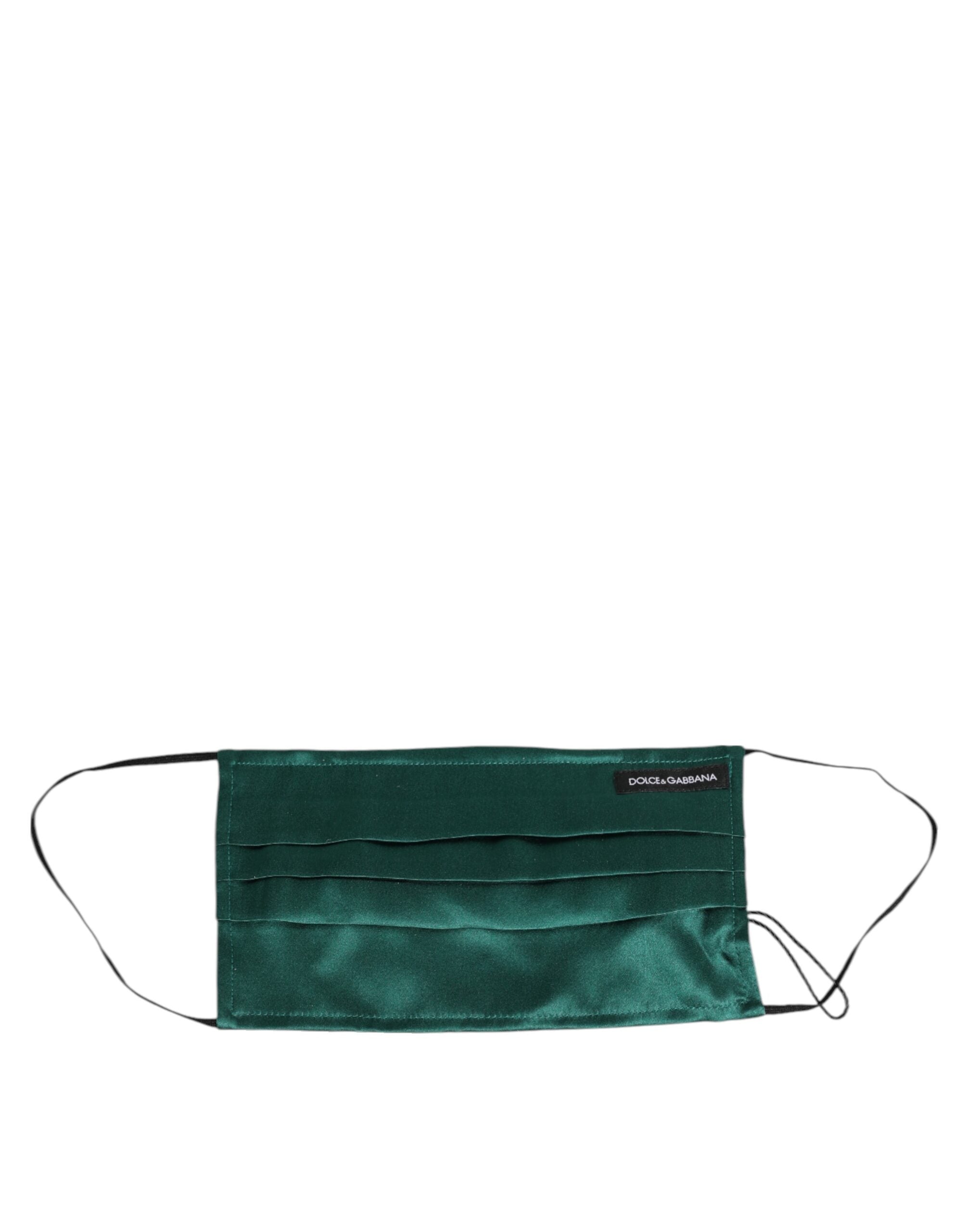Indulge in the Dolce & Gabbana Green Silk Pleated Face Mask, a testament to Italian craftsmanship that elevates your style with luxurious elegance and timeless allure.