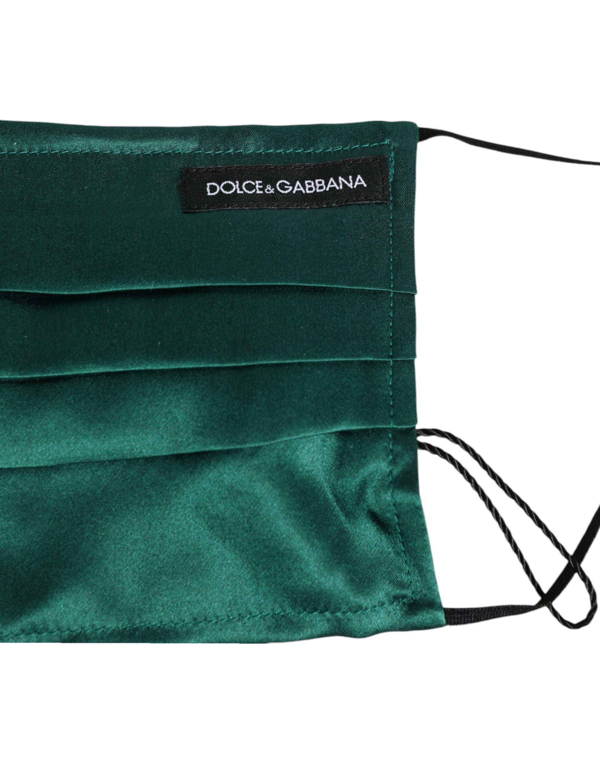 Indulge in the Dolce & Gabbana Green Silk Pleated Face Mask, a masterpiece of Italian craftsmanship that elevates your style with luxurious allure and sophisticated elegance.