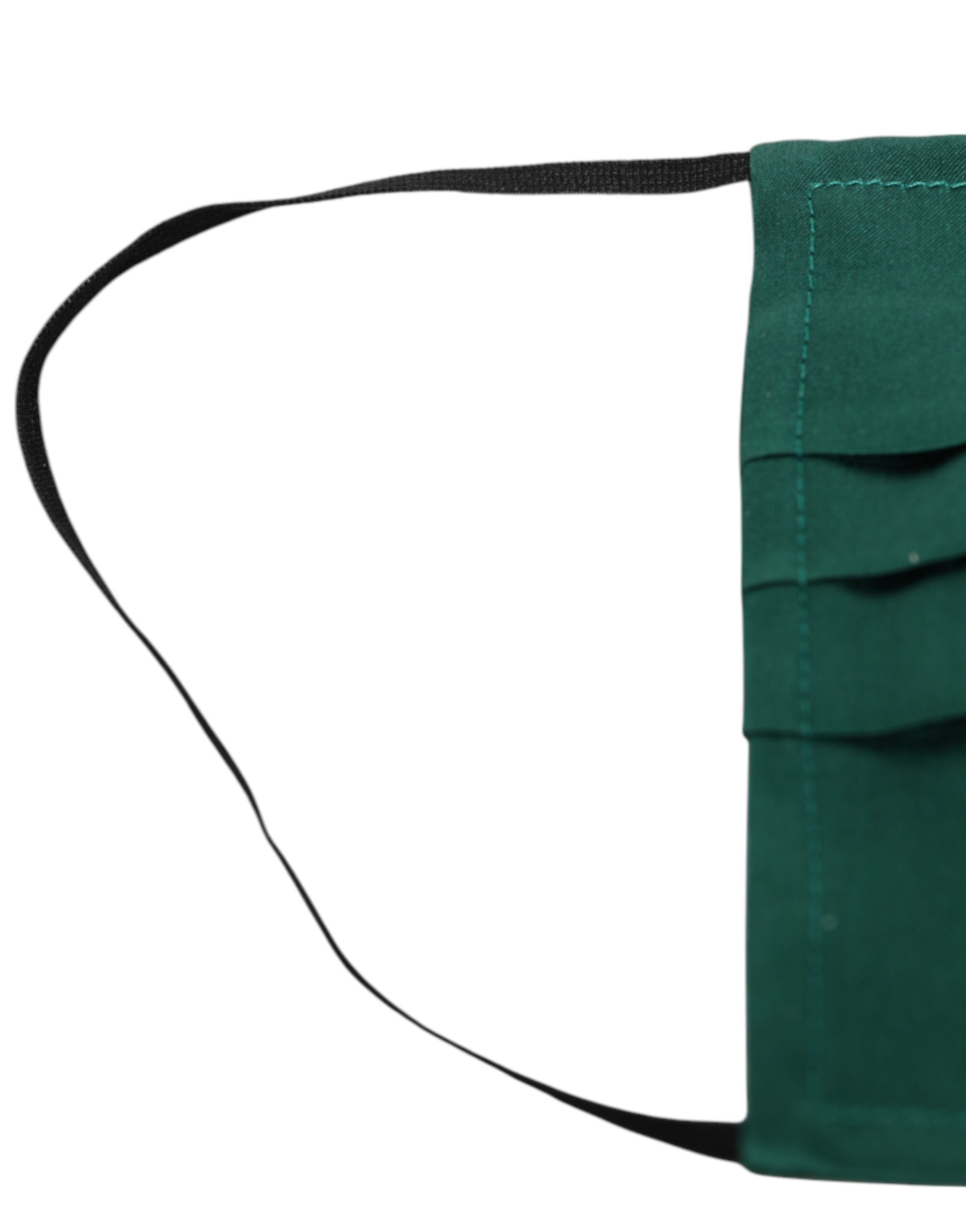 Indulge in the exquisite Dolce & Gabbana Green Silk Pleated Face Mask, a symbol of Italian craftsmanship that elevates your style with luxurious allure and sophistication.