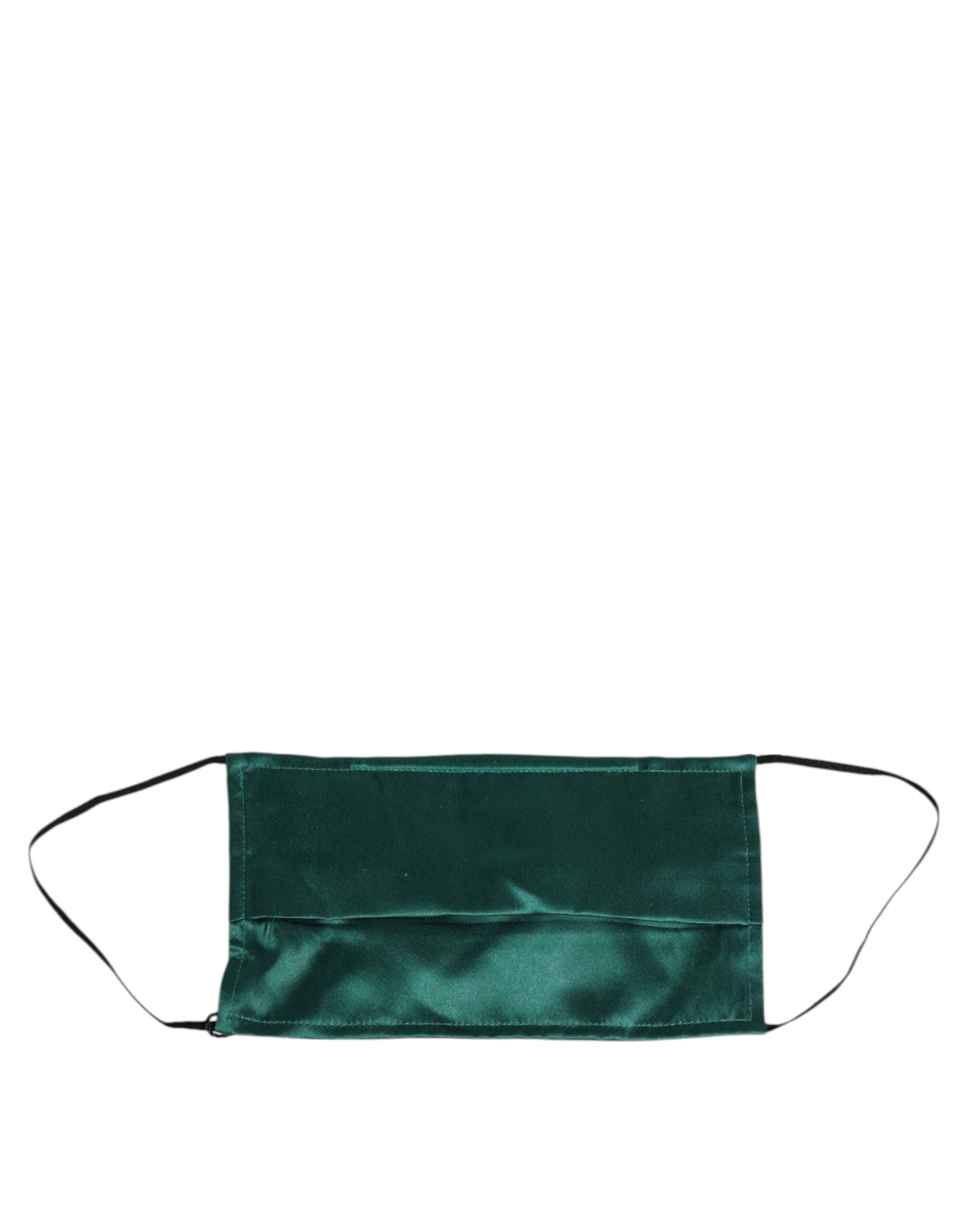 Indulge in the luxurious Dolce & Gabbana Green Silk Pleated Face Mask, a masterpiece of Italian craftsmanship that elevates your style with sophisticated allure.
