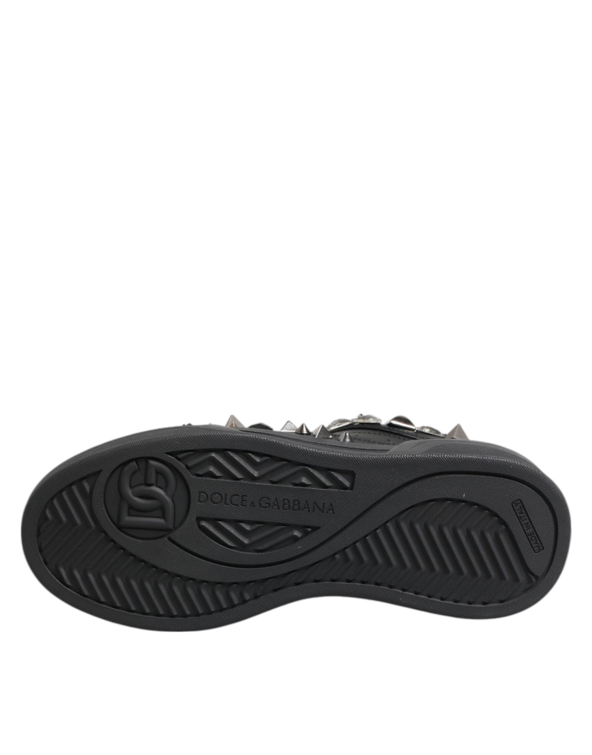 Indulge in the exquisite Dolce & Gabbana Black Leather Studded Low Top Sneakers, where unparalleled craftsmanship meets luxurious design for effortless elegance and timeless allure.
