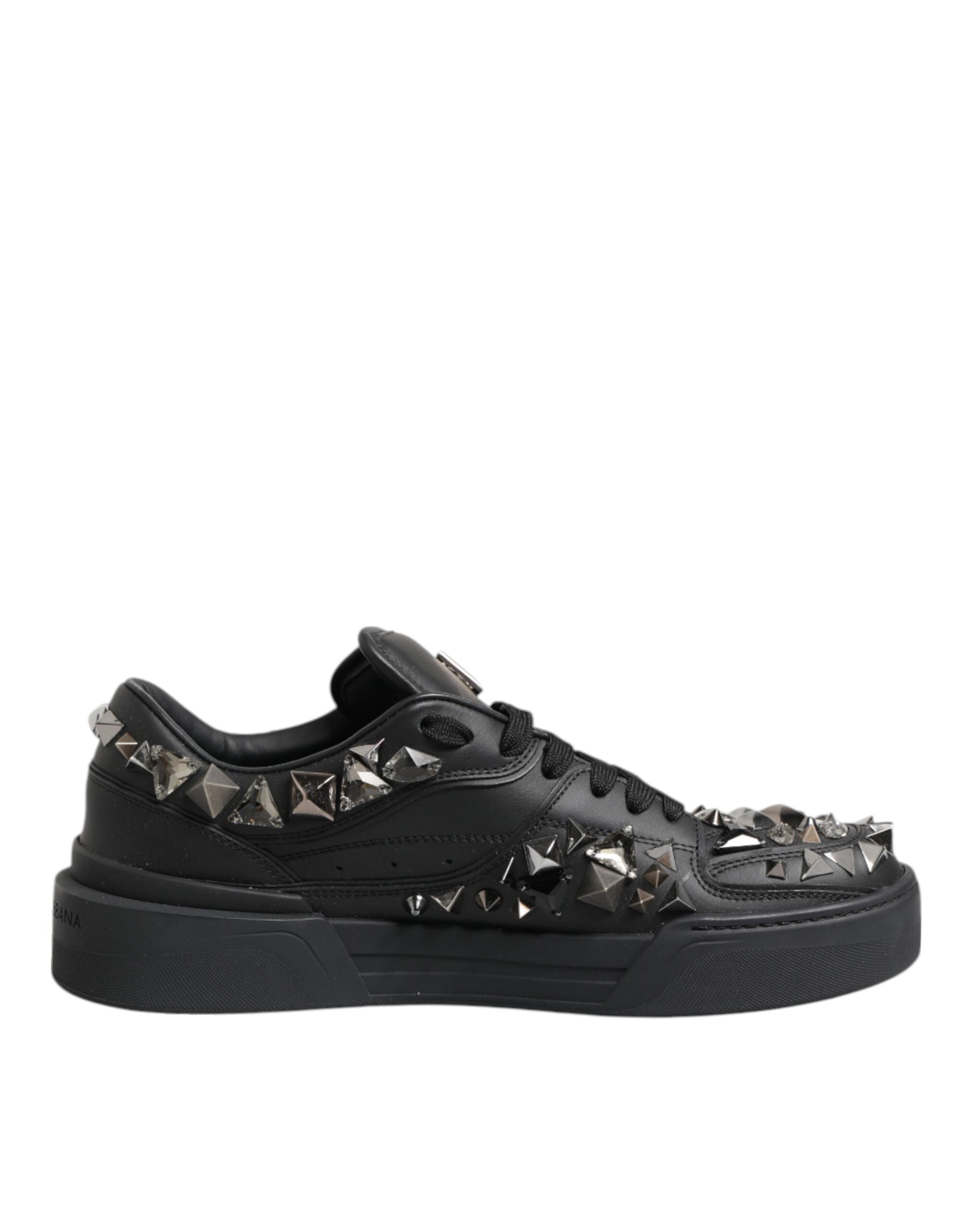 Indulge in the exquisite Dolce & Gabbana Black Leather Studded Low Top Sneakers, where unparalleled craftsmanship meets luxurious design for effortless elegance and timeless allure.