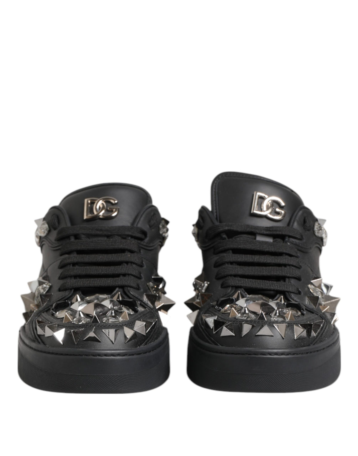 Indulge in the exquisite Dolce & Gabbana Black Leather Studded Low Top Sneakers, where unparalleled craftsmanship meets luxurious design for effortless elegance.