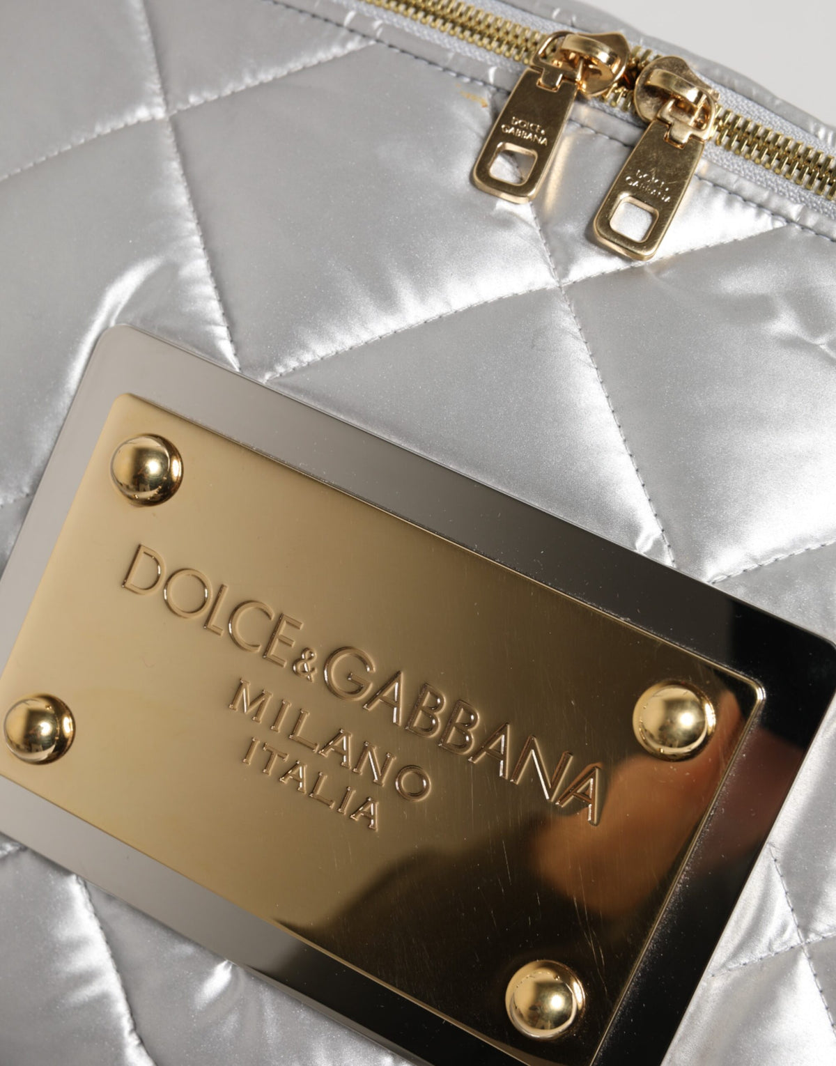 Indulge in the elegance of the Dolce & Gabbana Silver Quilted Filled Crossbody Shoulder Bag, a symbol of Italian craftsmanship and timeless luxury, perfect for every sophisticated occasion.