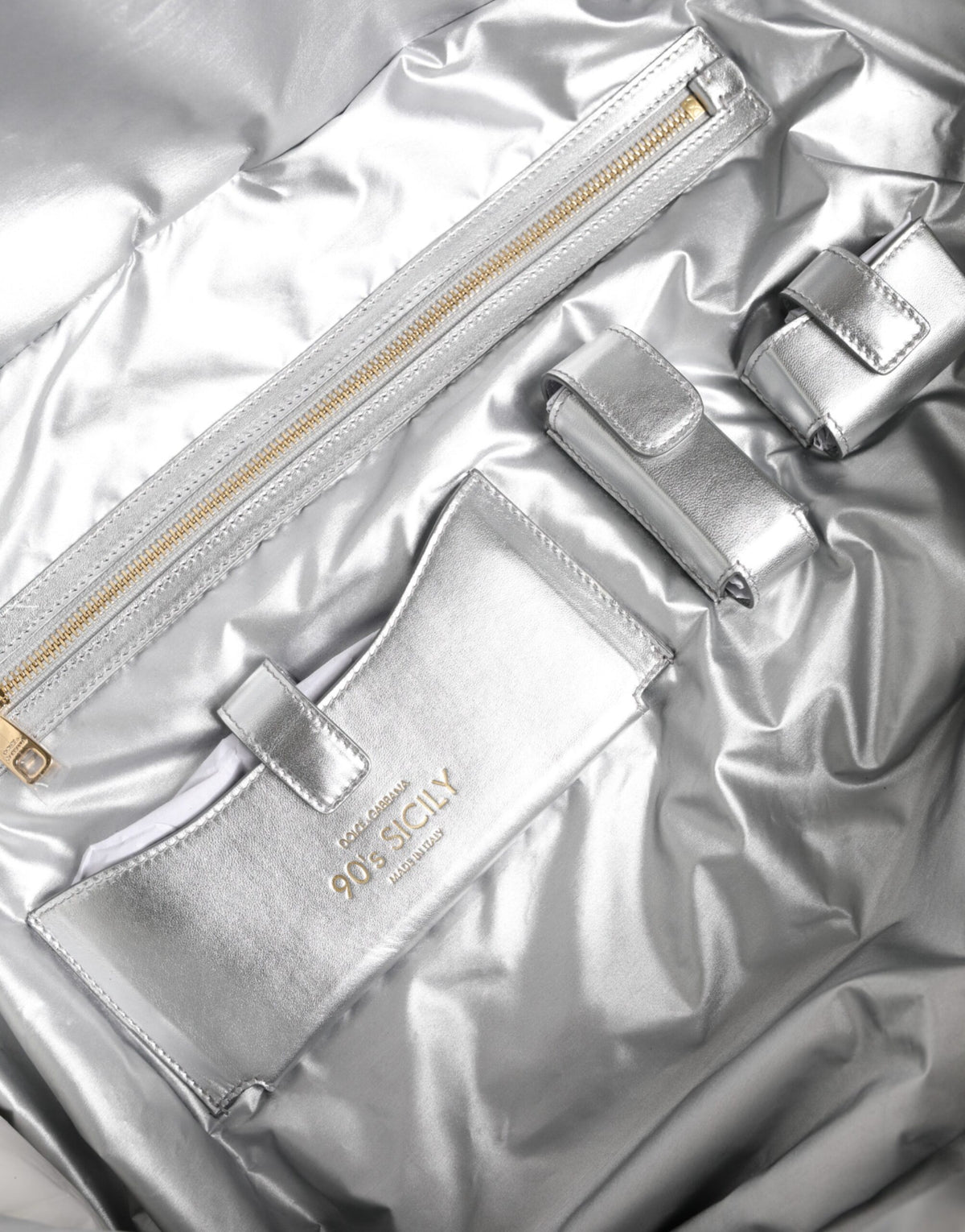 Indulge in the exquisite Dolce & Gabbana Silver Quilted Filled Crossbody Shoulder Bag, a symbol of Italian craftsmanship and timeless elegance, perfect for any occasion.