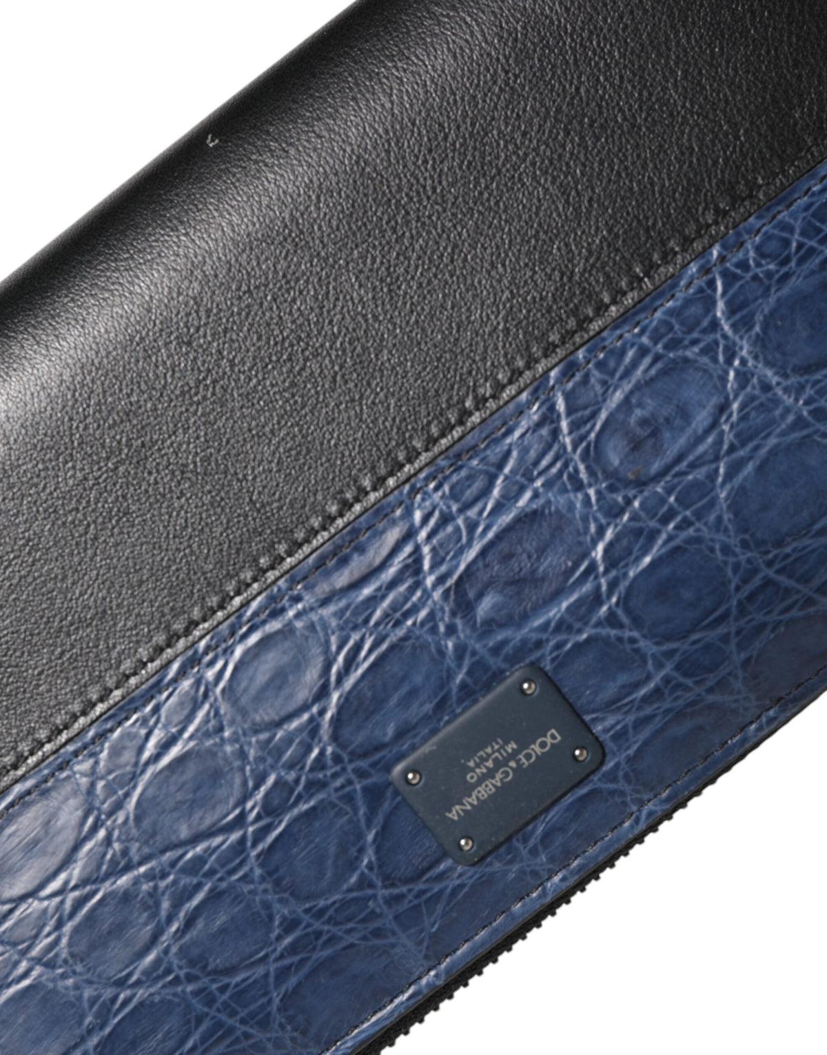 Discover the exquisite Dolce & Gabbana Black Blue Exotic Leather Continental Clutch, a timeless blend of Caiman and calfskin leather, embodying luxury and sophistication.