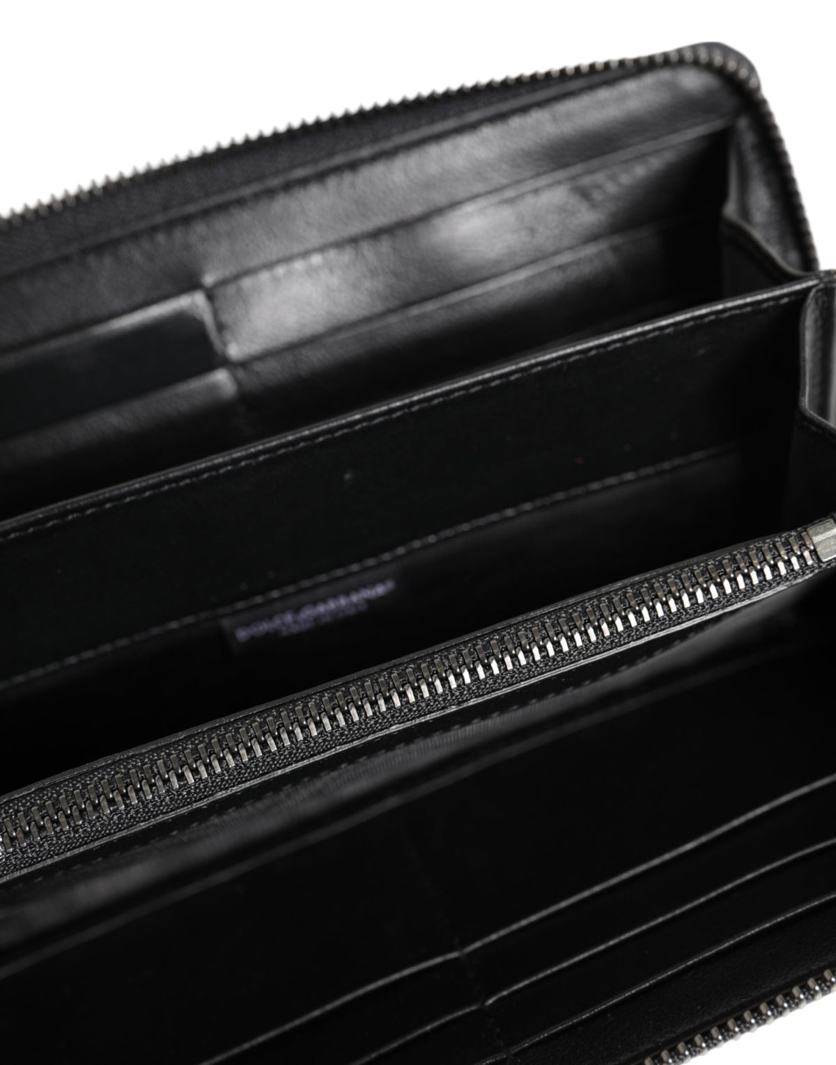 Elevate your style with the Dolce & Gabbana Black Blue Exotic Leather Continental Clutch, a masterpiece of exquisite craftsmanship and timeless elegance, perfect for the discerning individual.